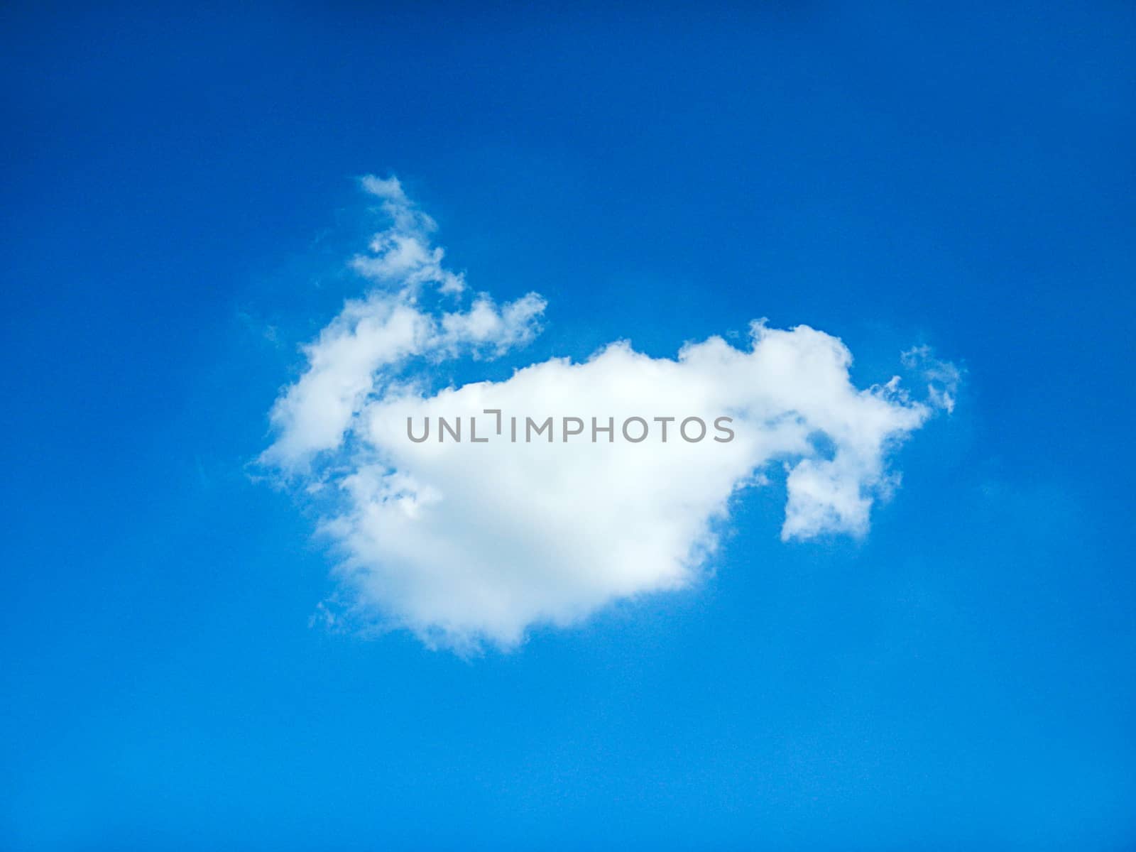 White clouds in blue sky by NuwatPhoto