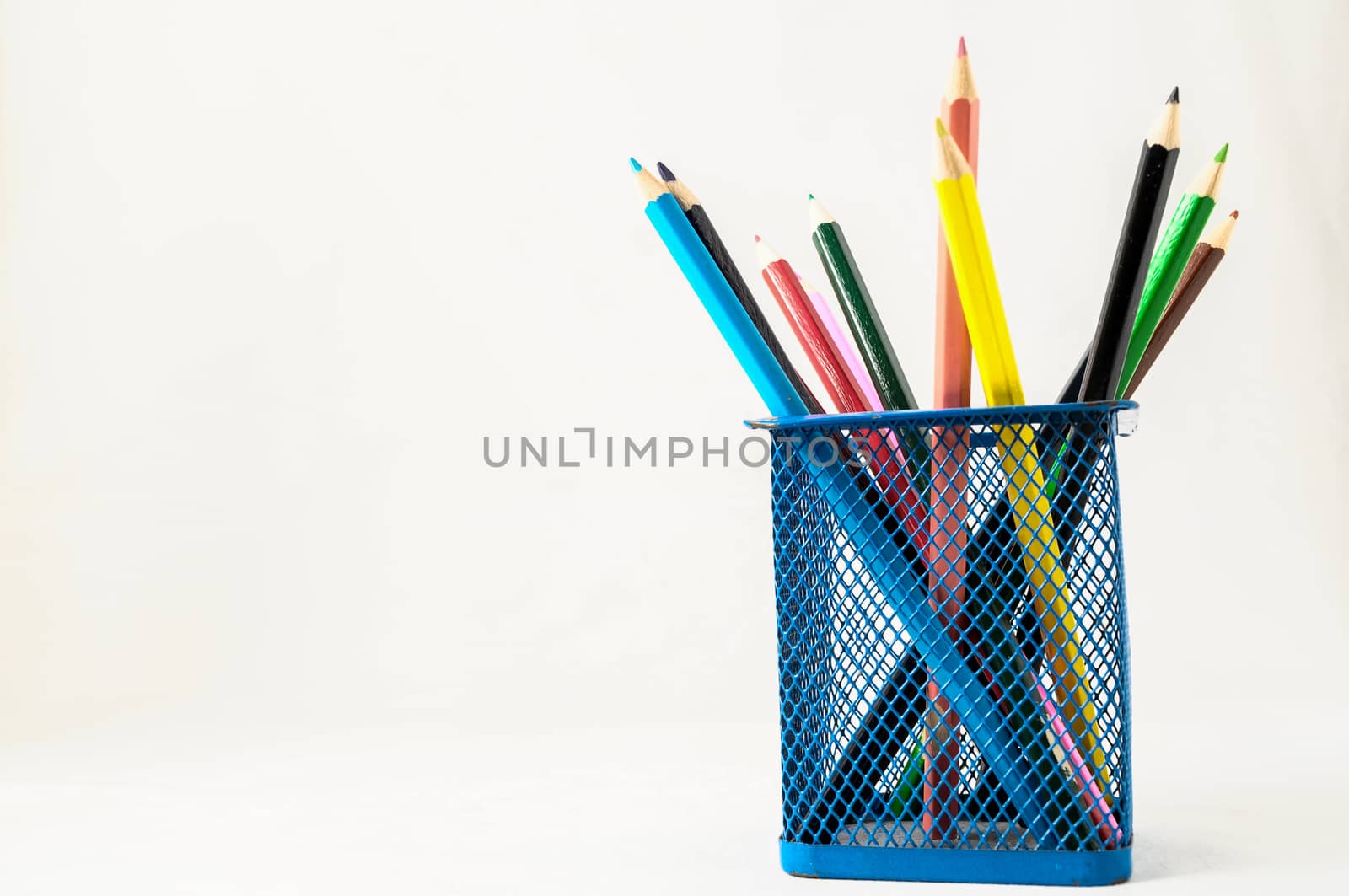 New Pencils Textured Set in Container box on a White Background