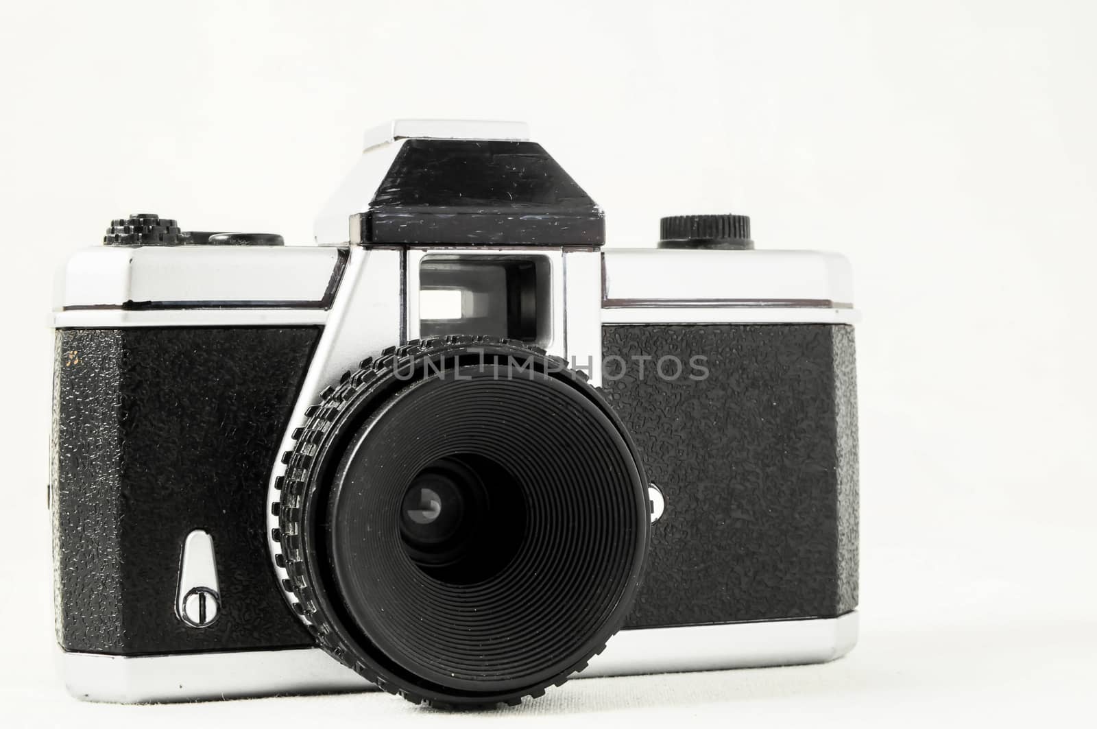 Classic 35mm Plastic Toy Photo Camera on a White Background
