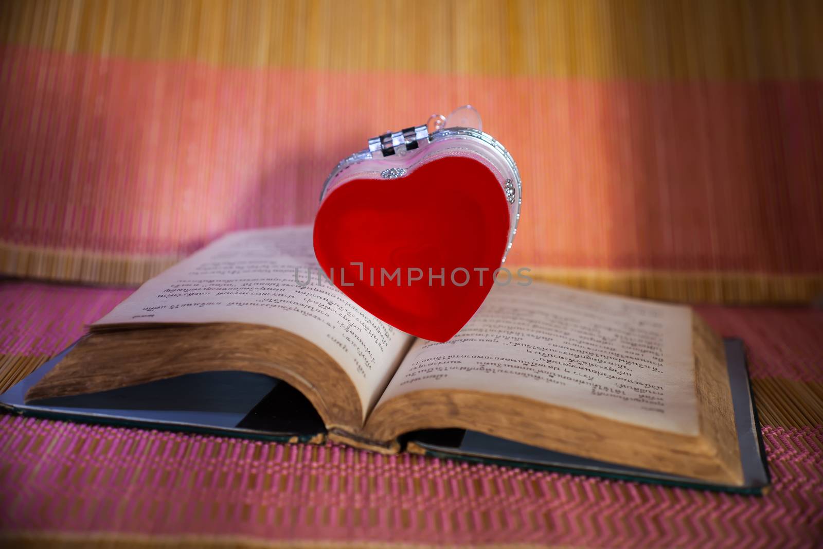 red heart on opened book. by amnarj2006