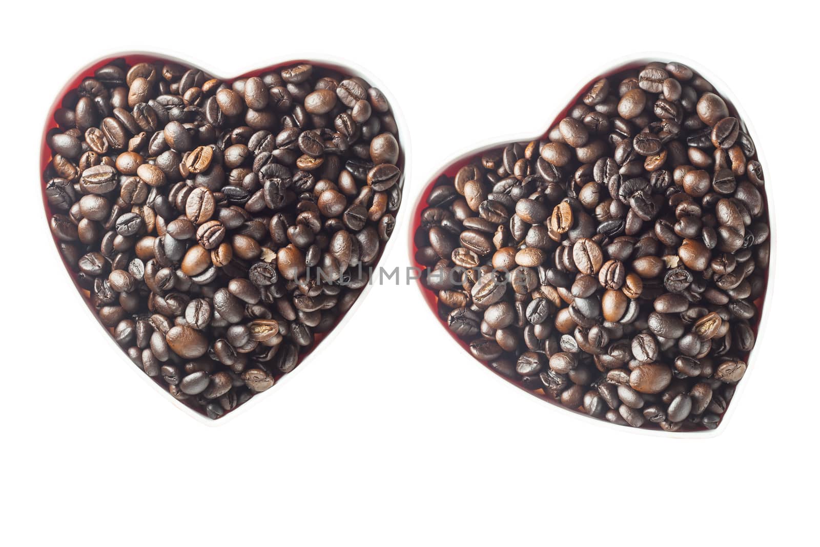 Heart shaped coffee in coffee beans, Valentines day