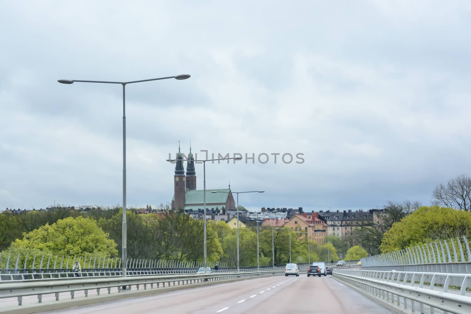 STOCKHOLM, SWEDEN ON MAY 9 2014: View on Vasterbron with Hogalid Church on Sodermalm in May 2014, Stockholm, Sweden.