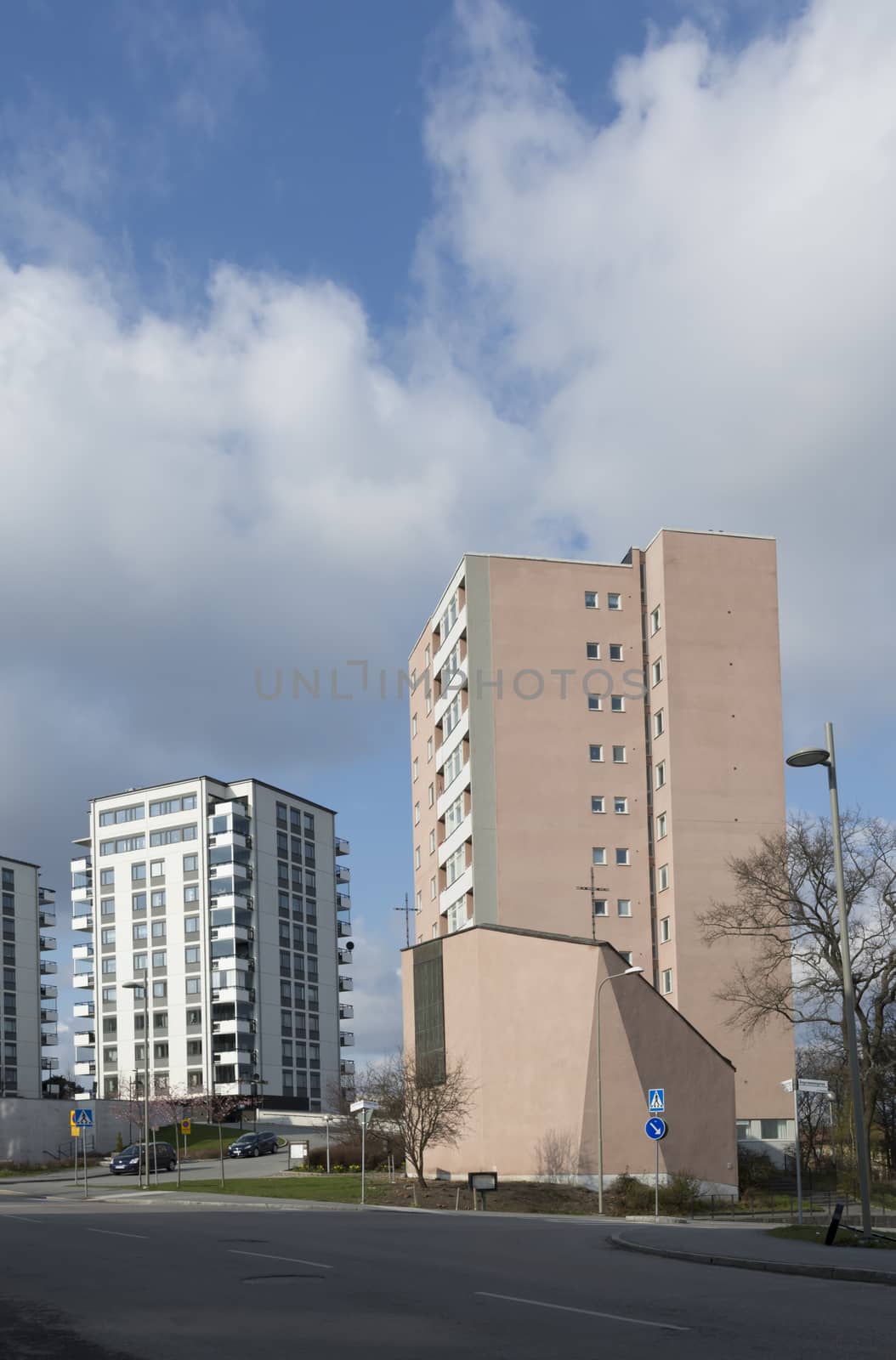 VÄLLINGBY, STOCKHOLM, SWEDEN ON APRIL 20, 2014: High rise residential architecture, fifties church building on April 20, 2014 in Vallingby, Stockholm, Sweden.