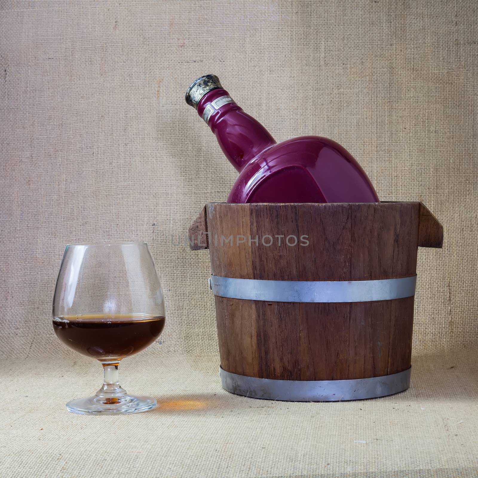 Cognac glass and bottle