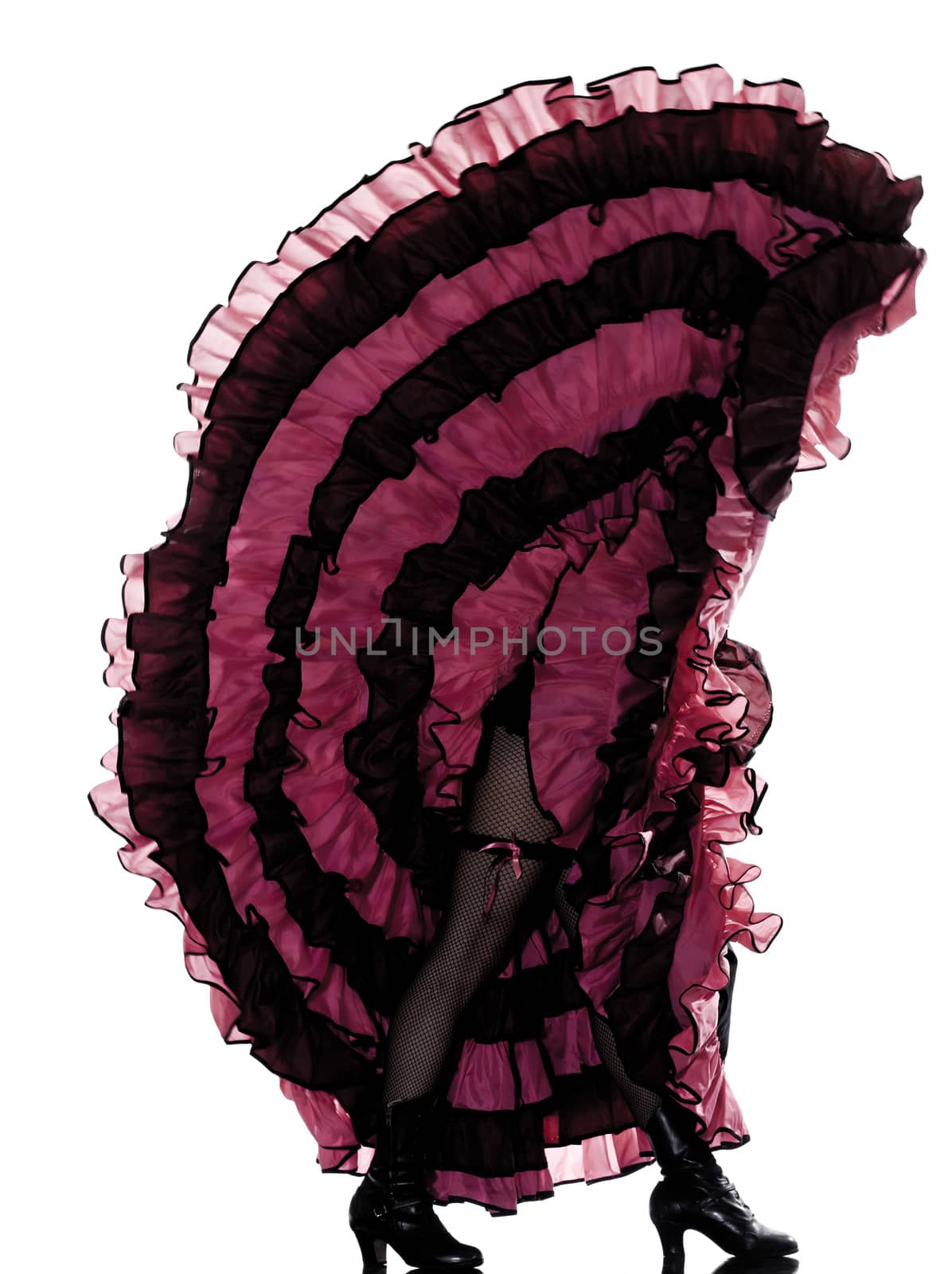 woman dancer dancing french cancan in studio isolated on white background