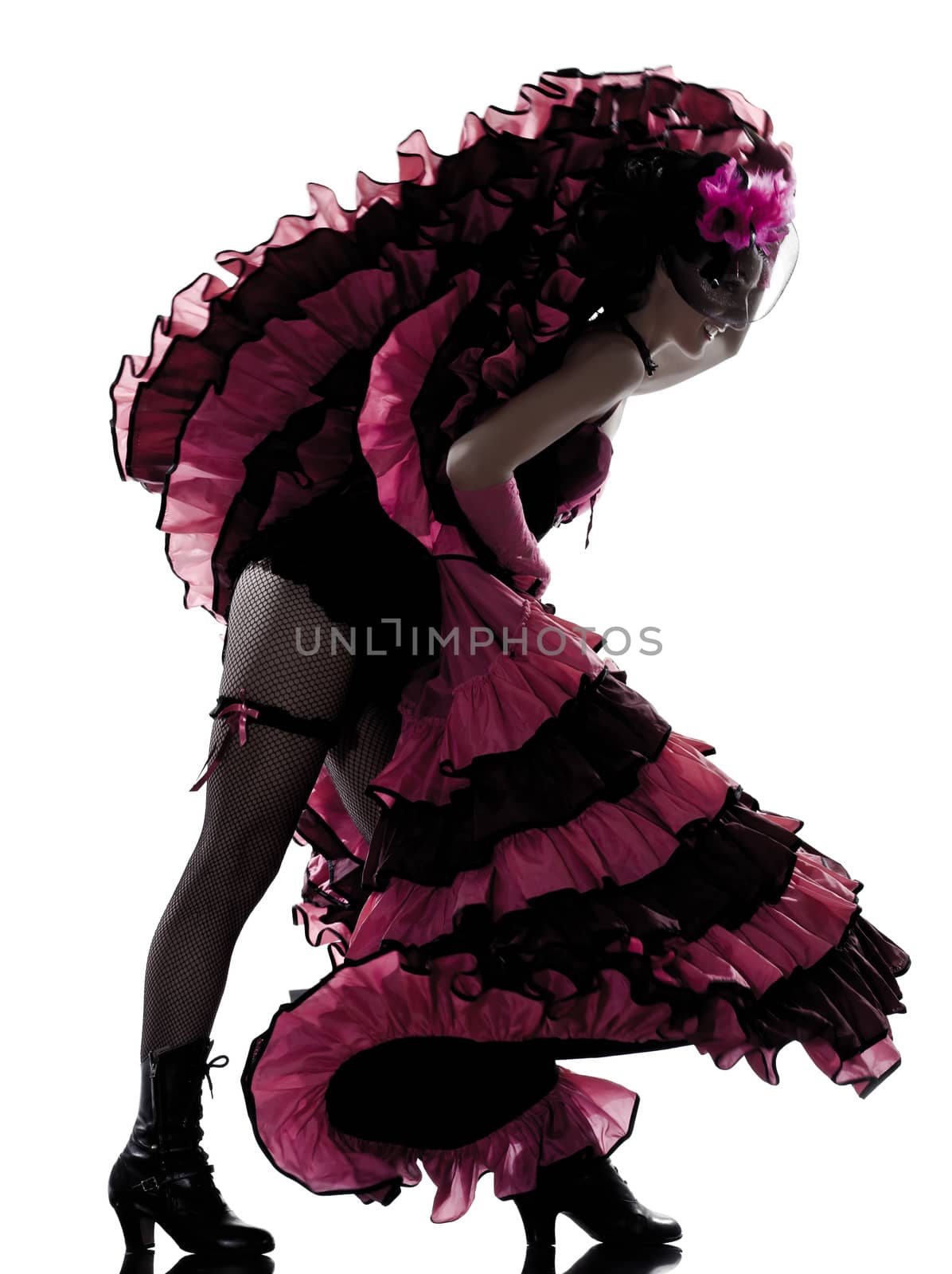 woman dancer dancing french cancan in studio isolated on white background