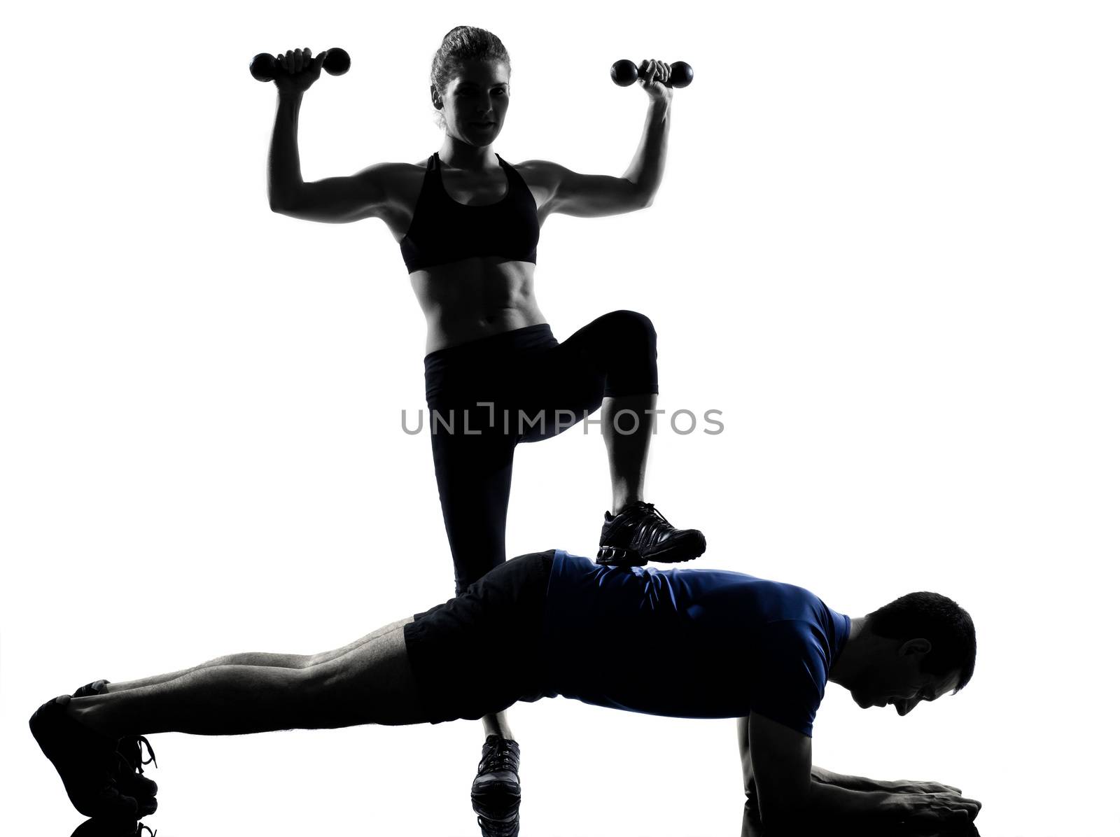 couple woman man exercising workout  silhouette by PIXSTILL