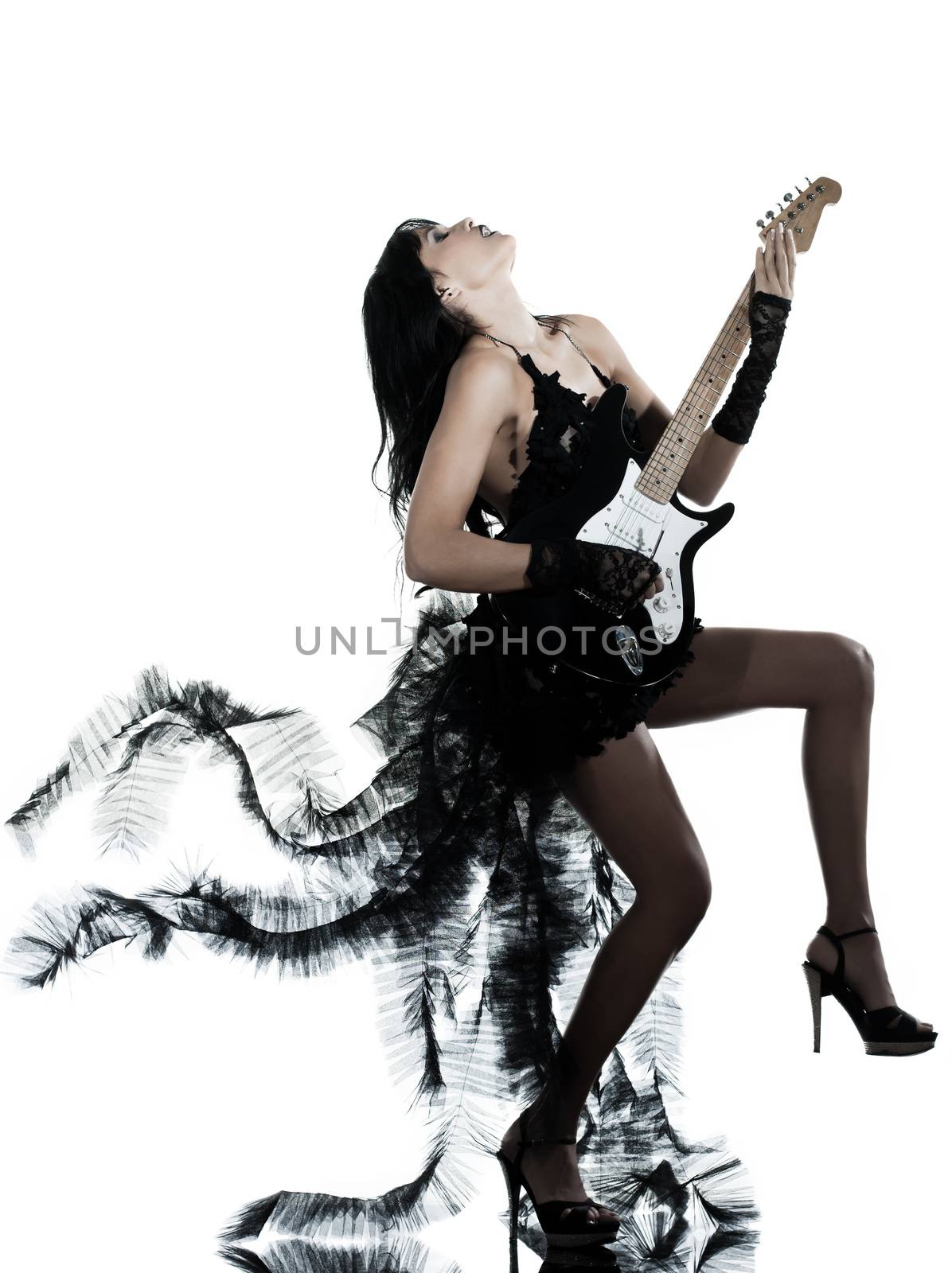one woman playing electric guitar on studio isolated white background