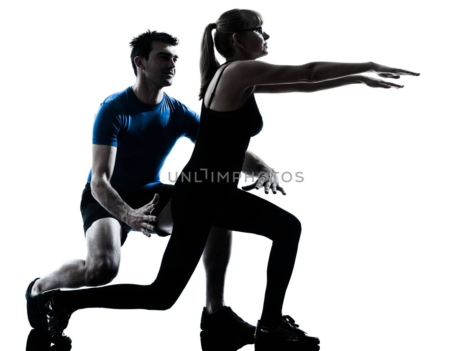 aerobics instructor with mature woman exercising fitness workout in silhouette studio isolated on white background
