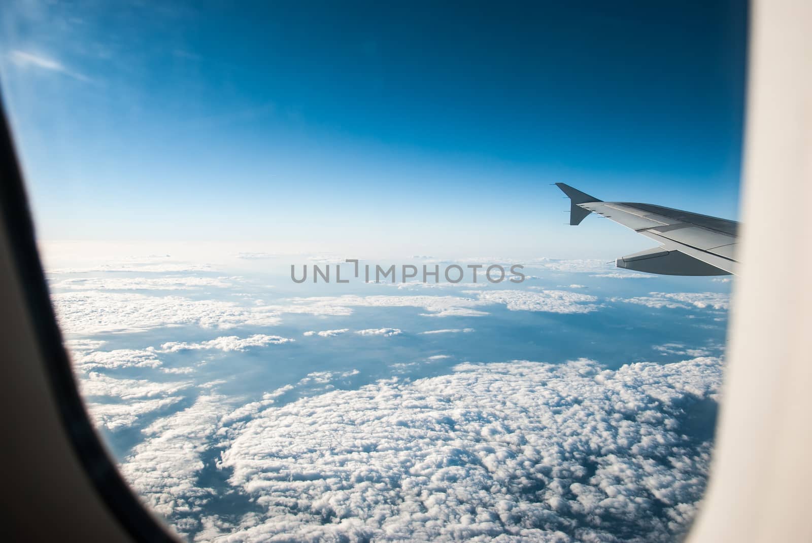 view from an airplane above the clouds