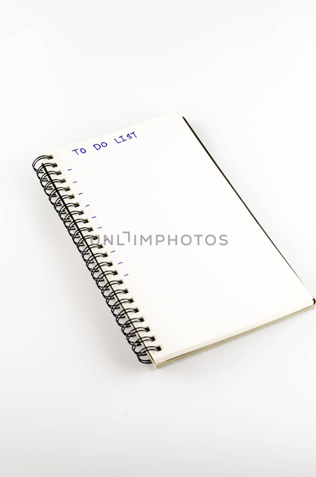 notebook write to do list word on a white back ground