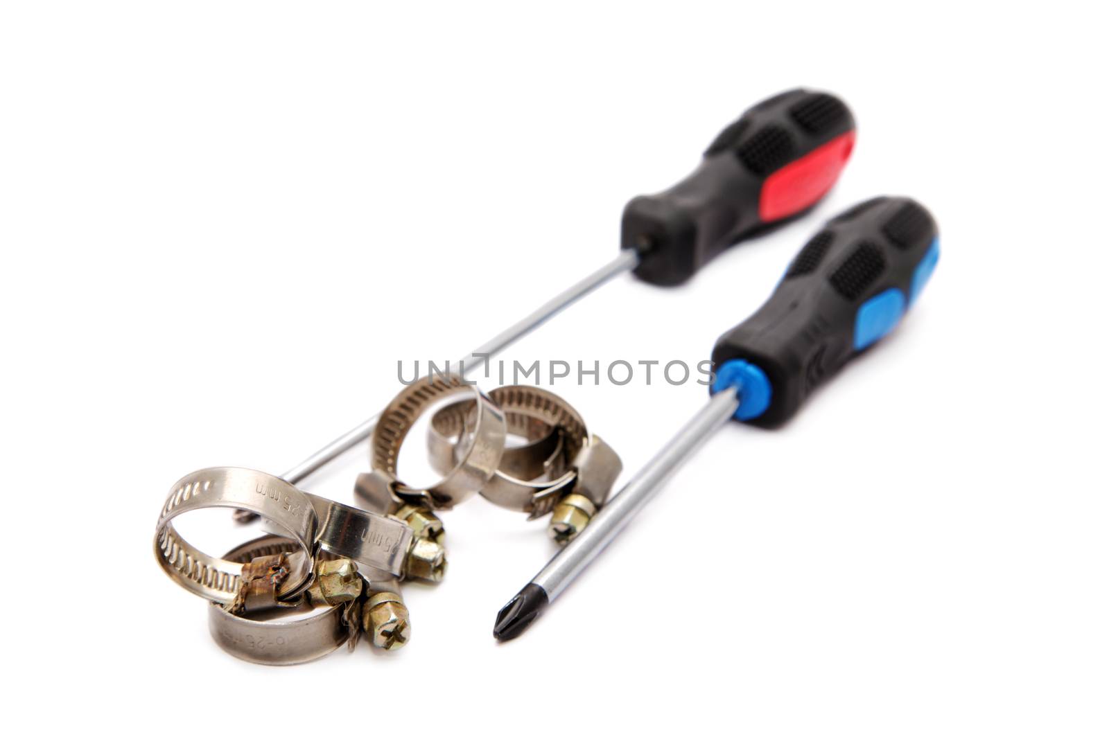Screw-drivers and screw collars isolated on a white background