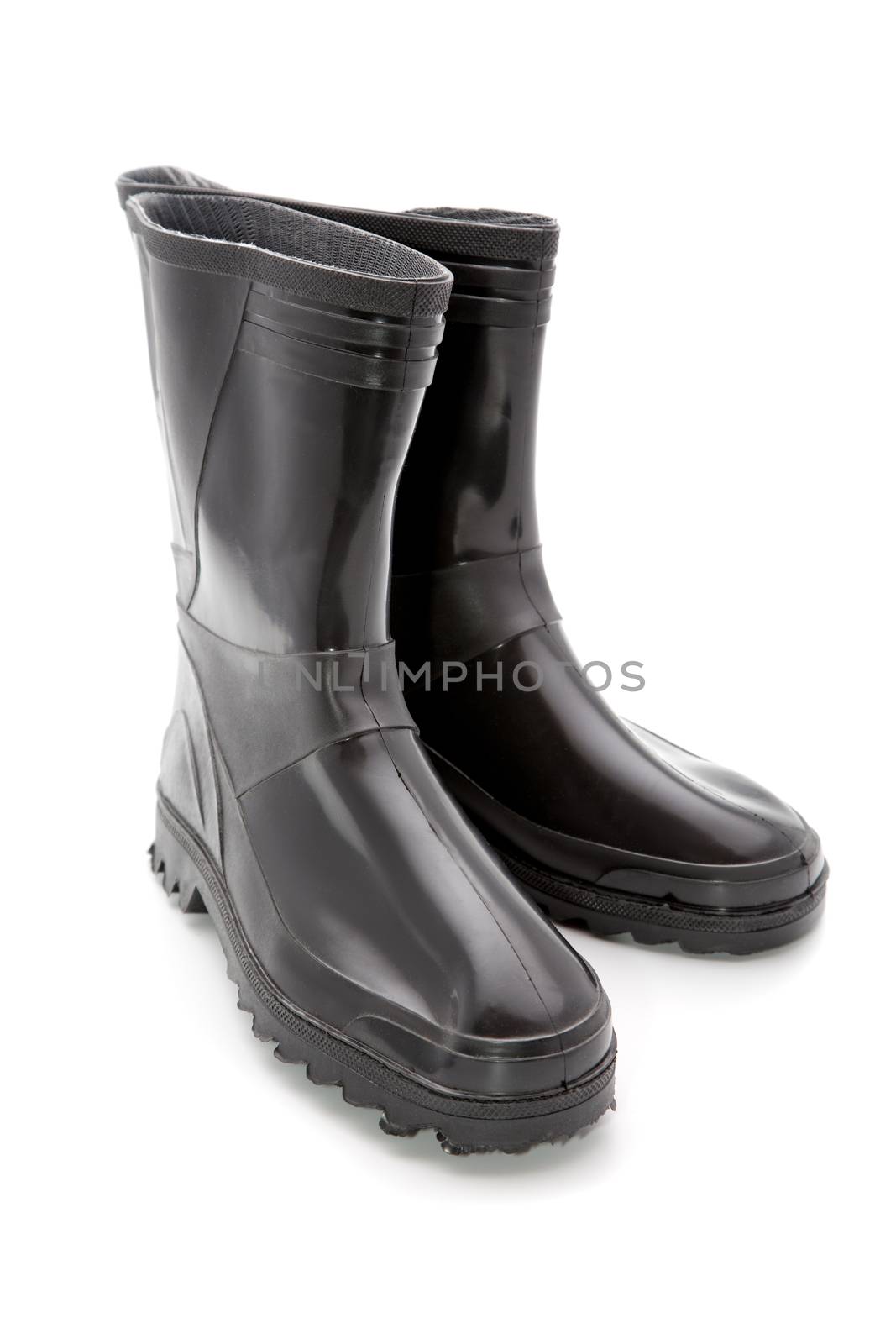 Black man's rubber boots on a white background by alarich