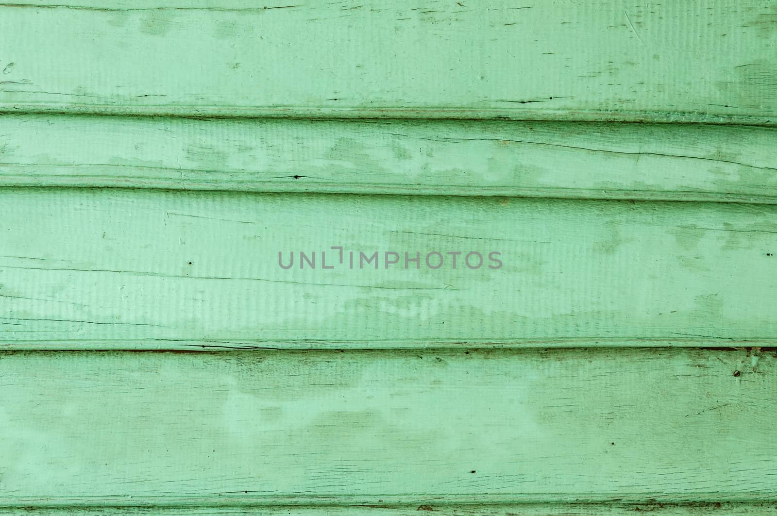 Old wooden painted green by NuwatPhoto