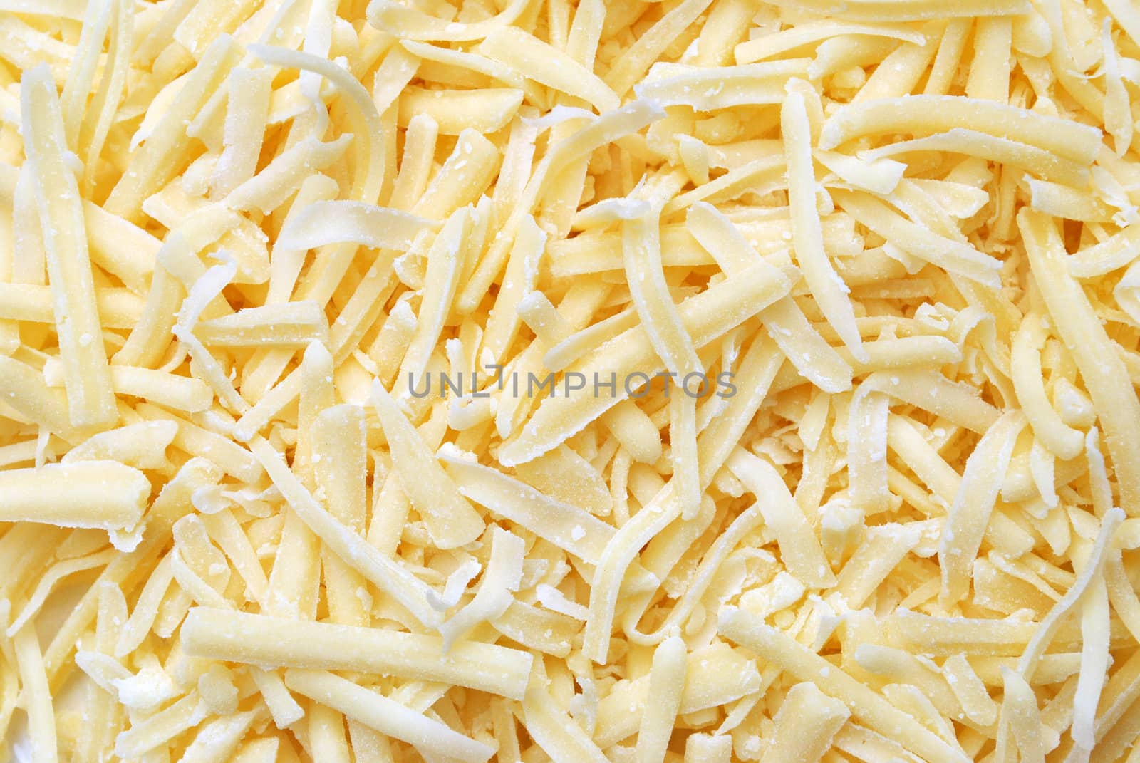 A Colourful photo of Grated cheese for a background