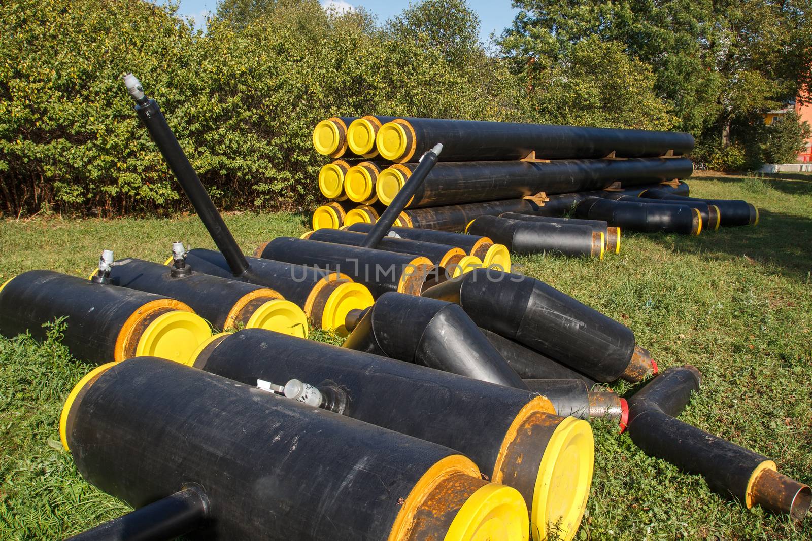 Some new yellow and black pipes that are going to be used for construction