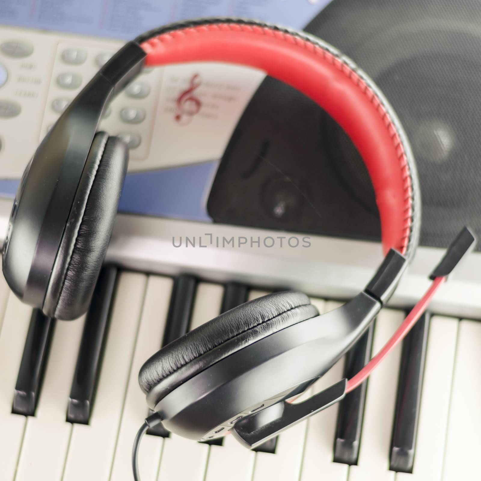 headphones on electric  music instrument piano keyboard