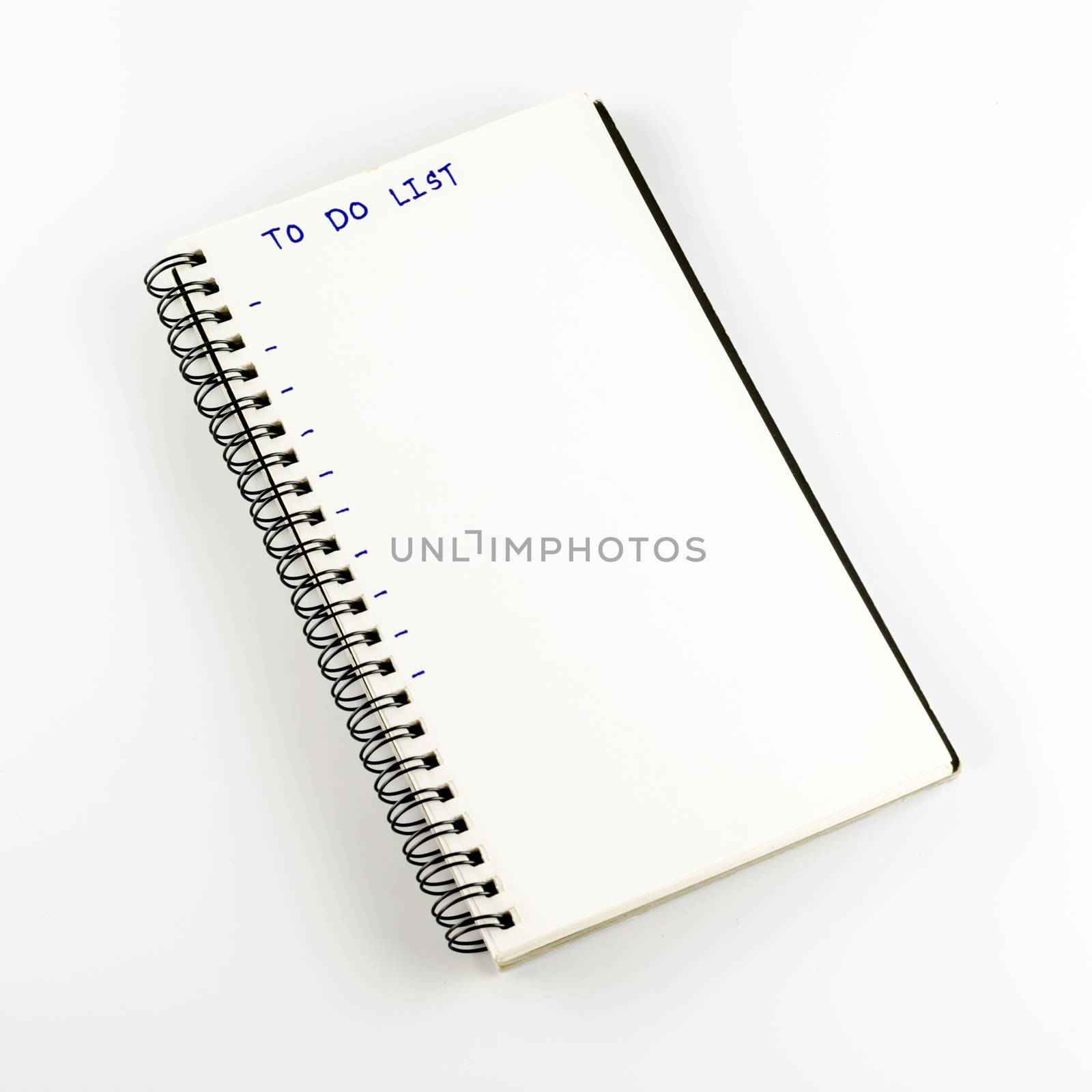 notebook write to do list word on a white back ground