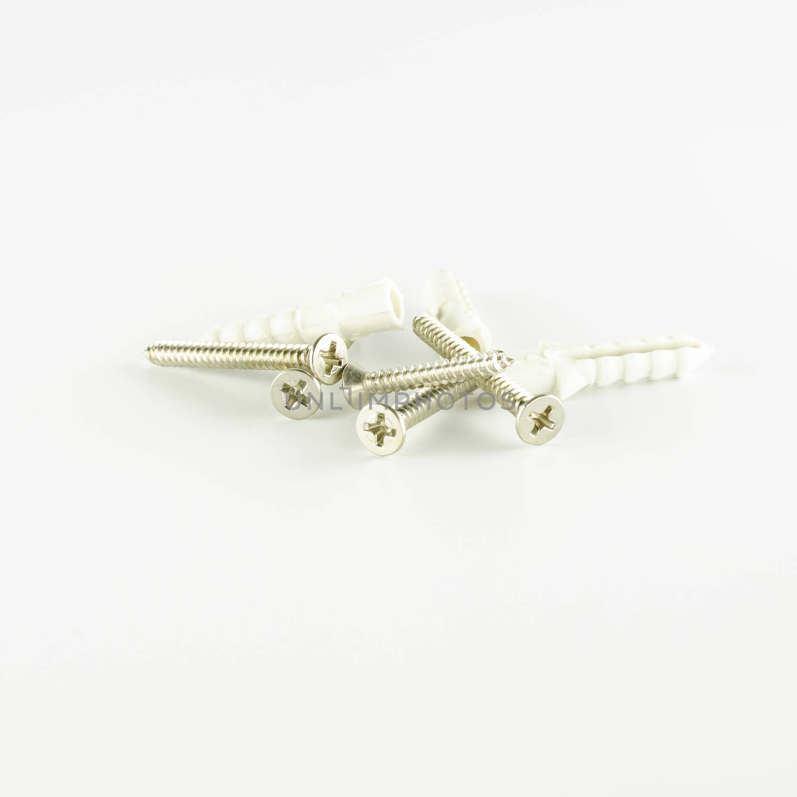 groups of screws on a white background