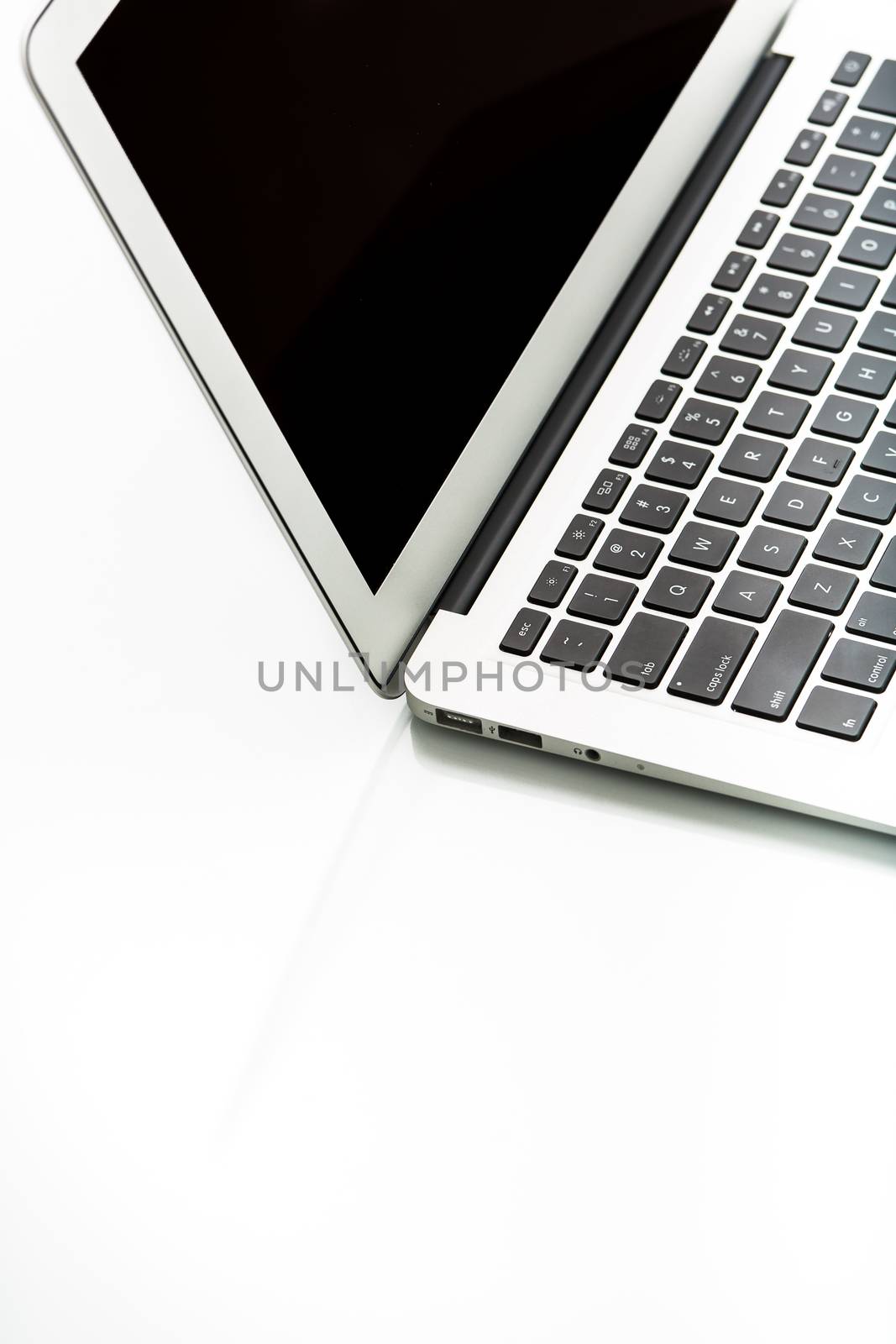 Modern laptop computer on white by viktor_cap