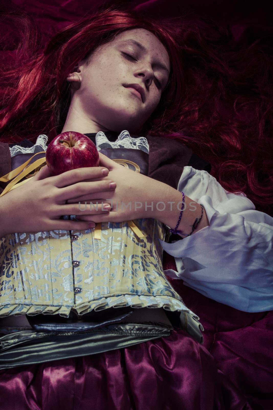 Fairytale, Teen with a red apple lying, tale scene