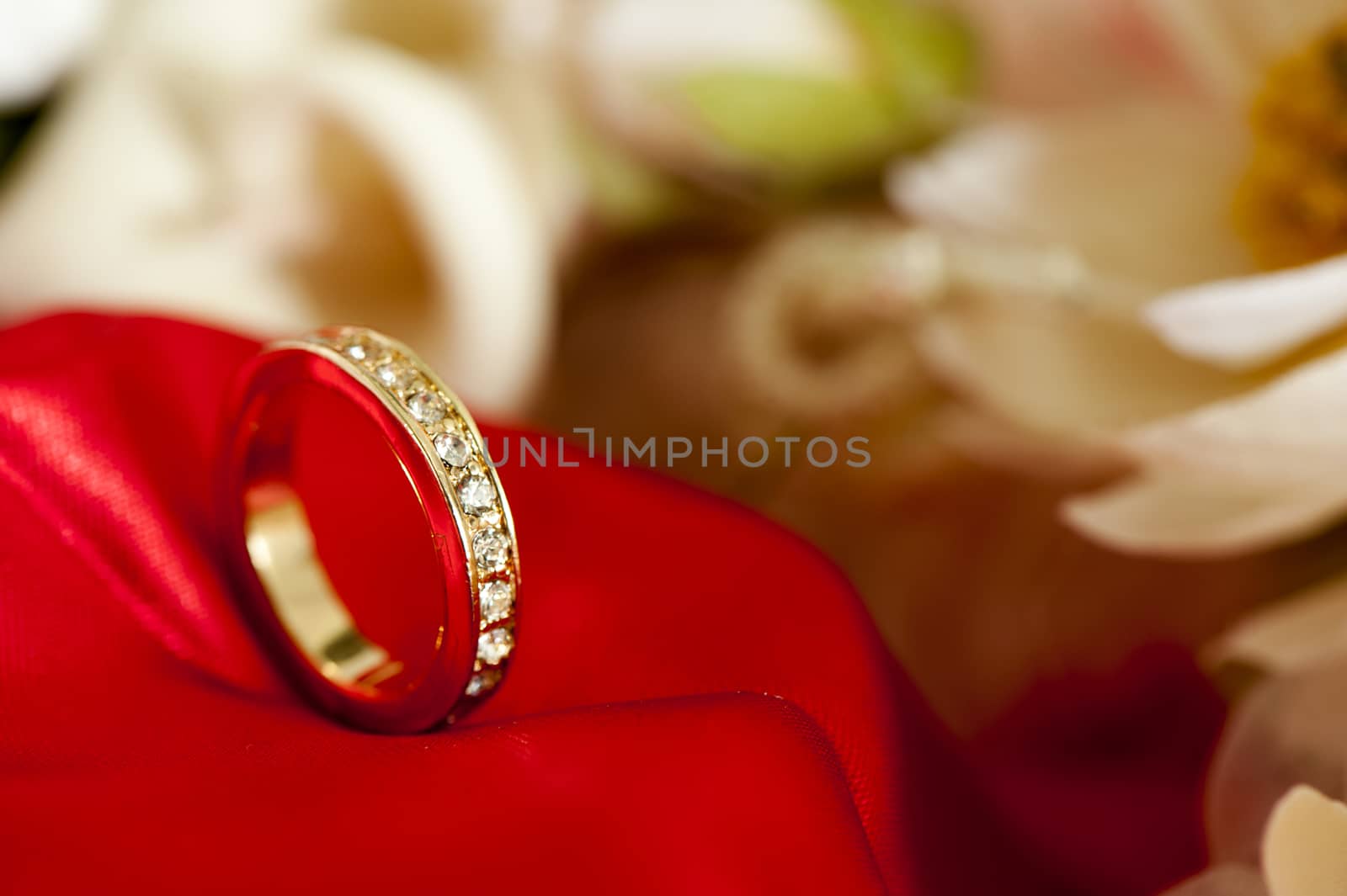  wedding rings on colorful fabric  by carla720