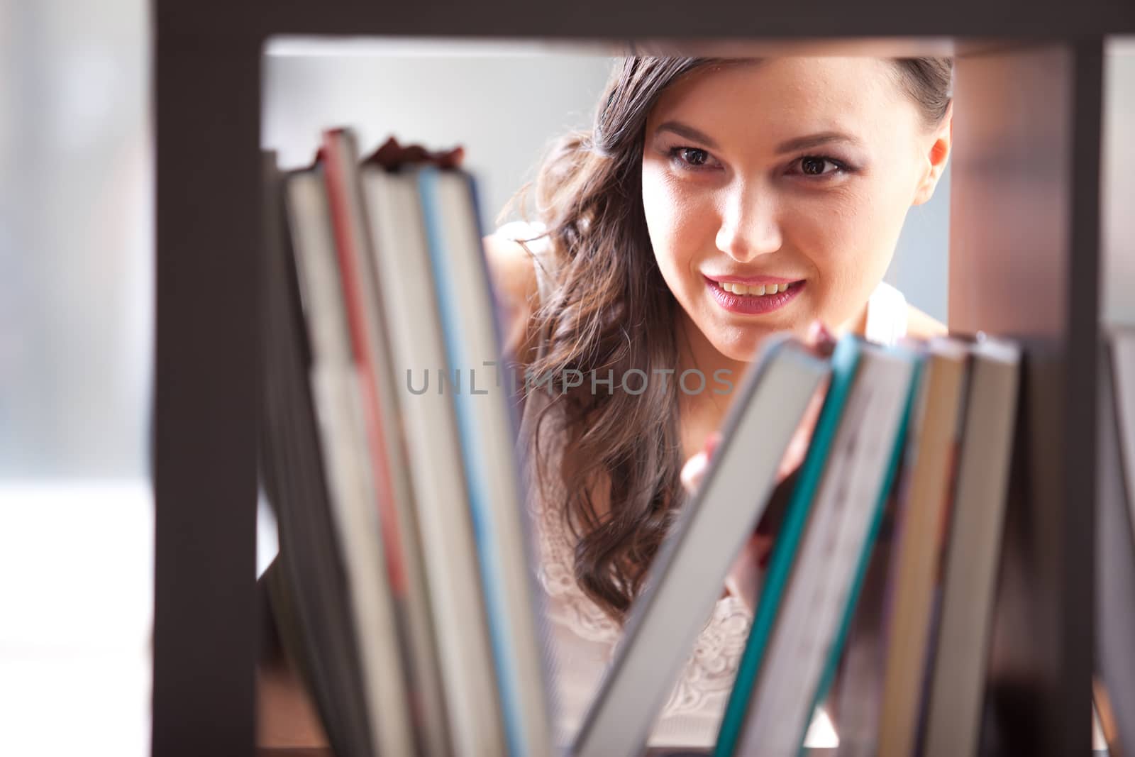 A portrait of an  college student studying in the library