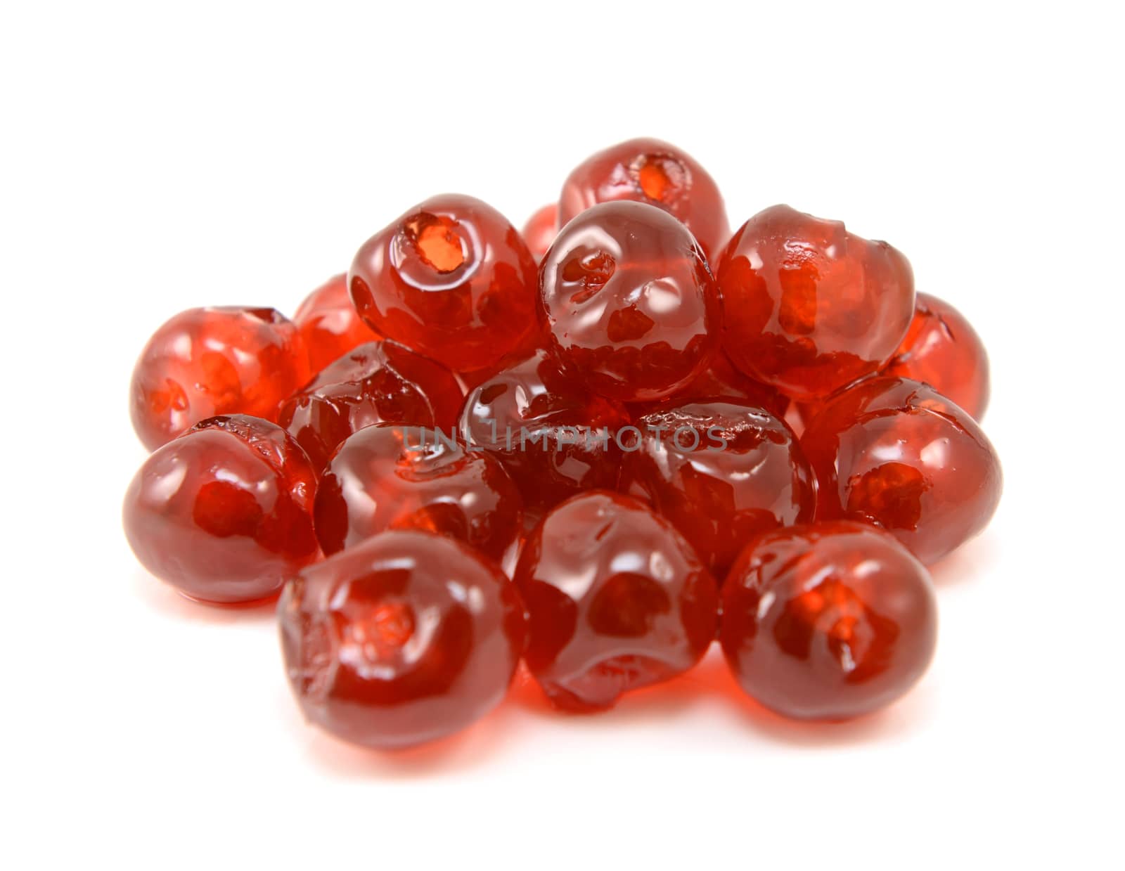 Sticky glace cherries, isolated on a white background