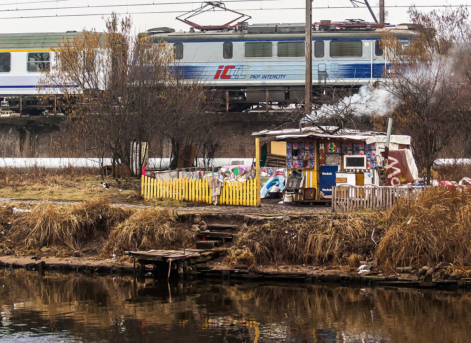 Szczecin, Poland - March 5, 2014: Homeless camp near the railroad tracks.