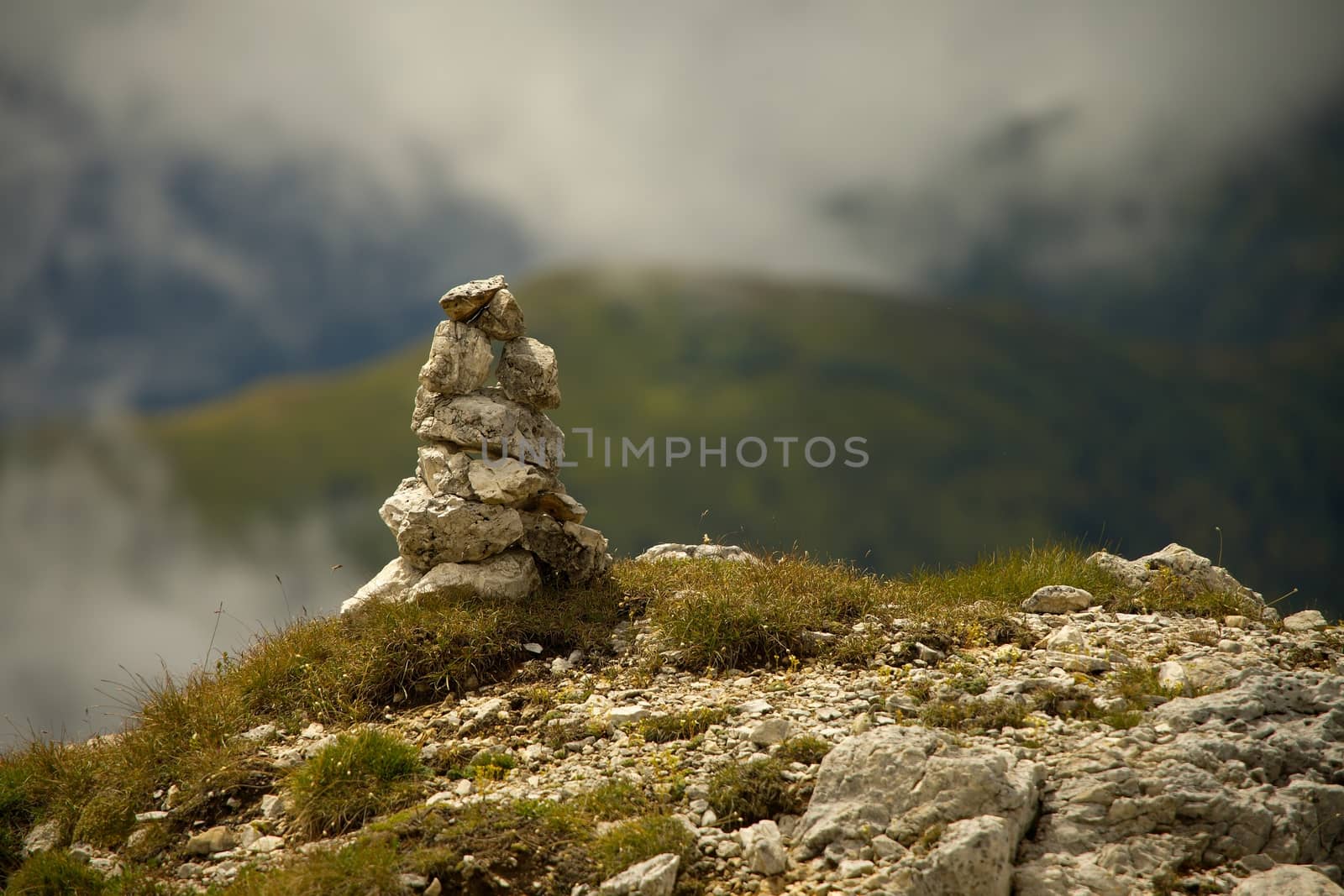 Pile of srones near a mountain path