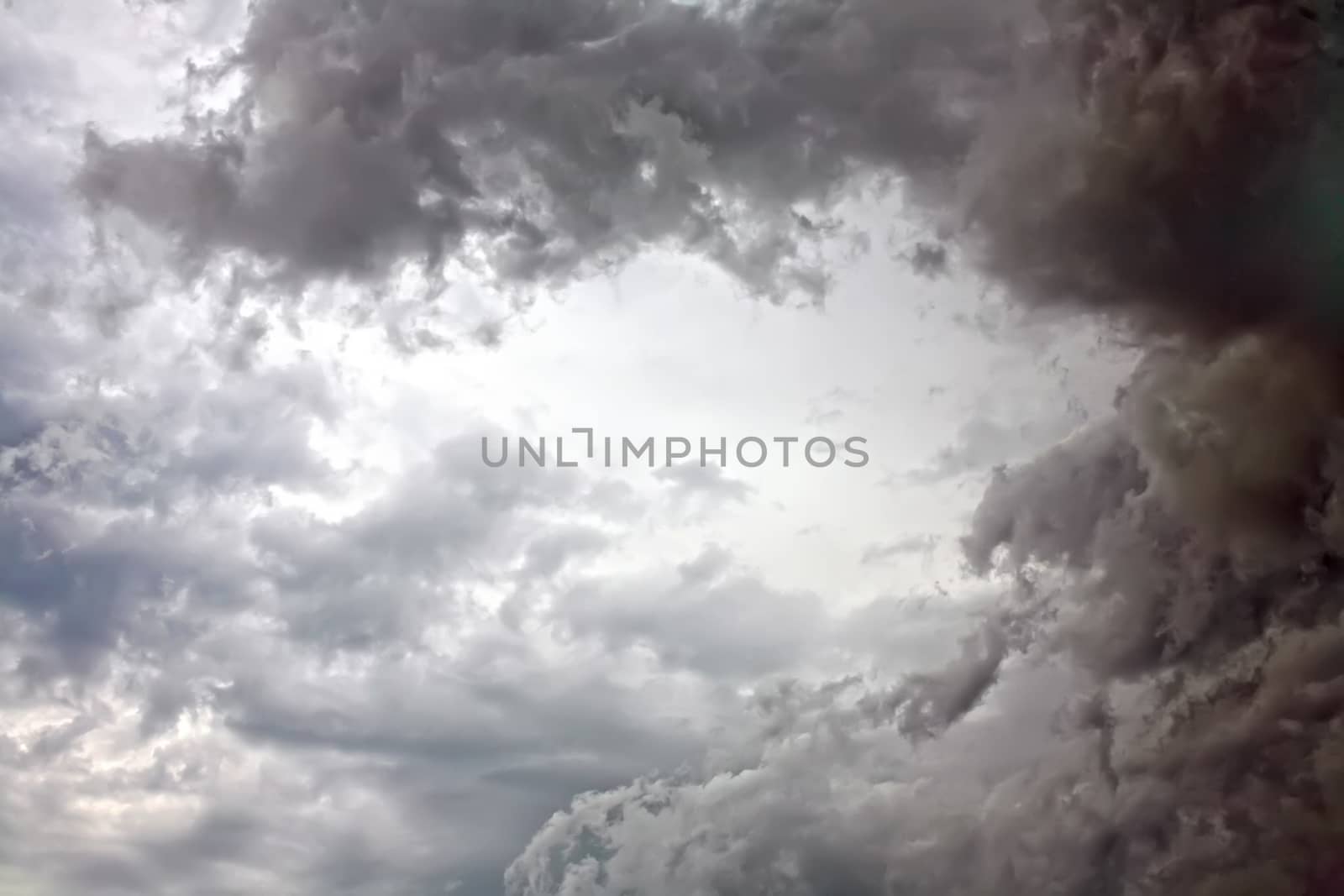 Background abstract image in the form of an overcast cloudy sky gray tones