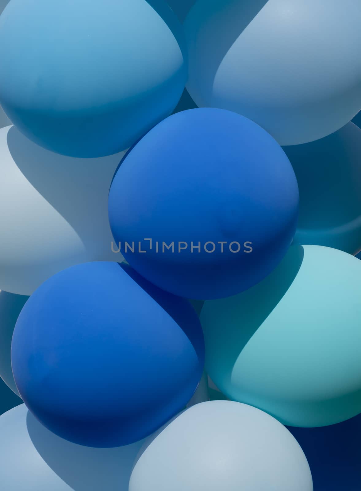 Full frame of blue balloons, anniversary, celebration, festive background, backdrop or texture.
