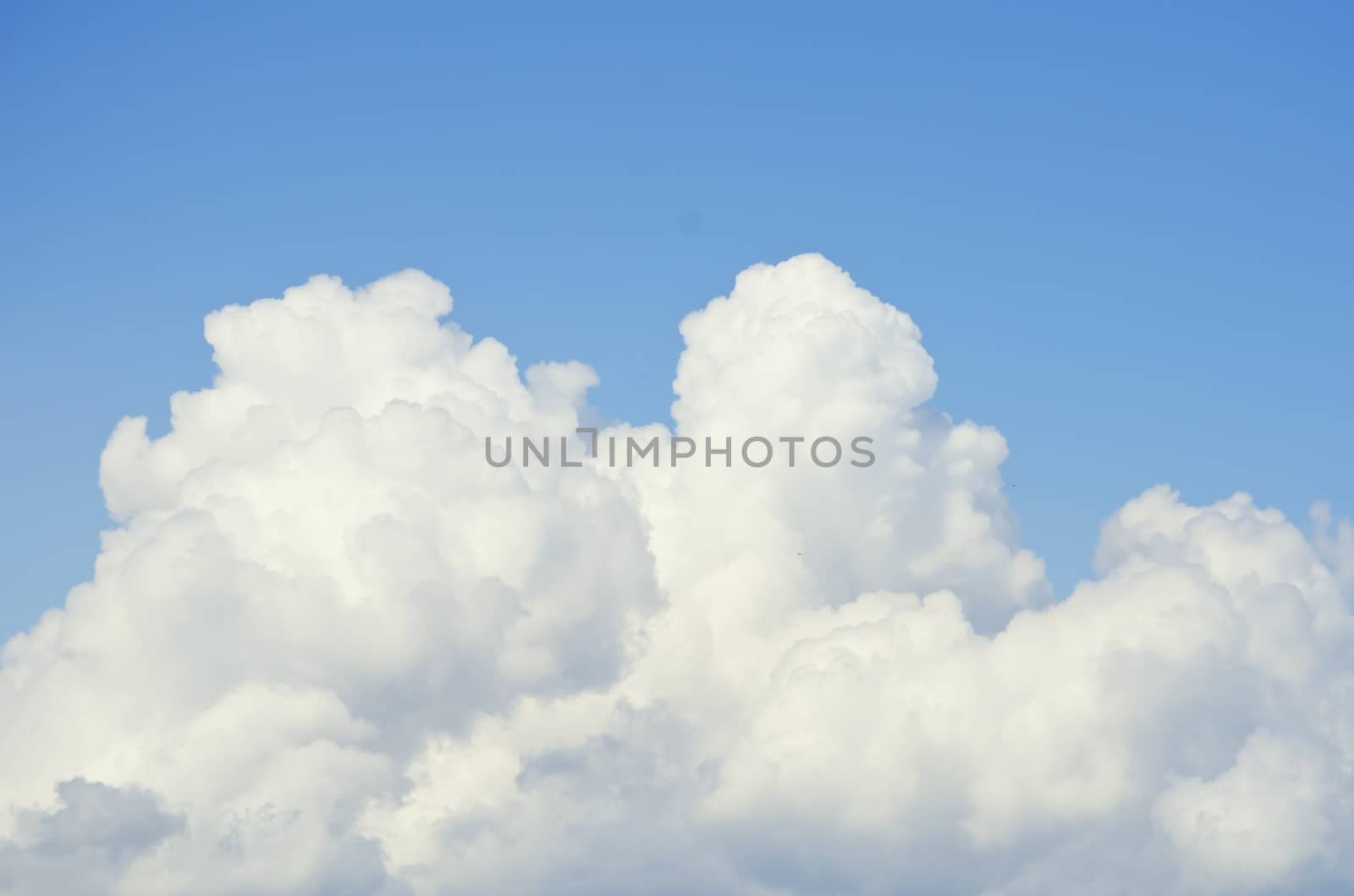 Photo of Bright Blue Cloudy Sky Background