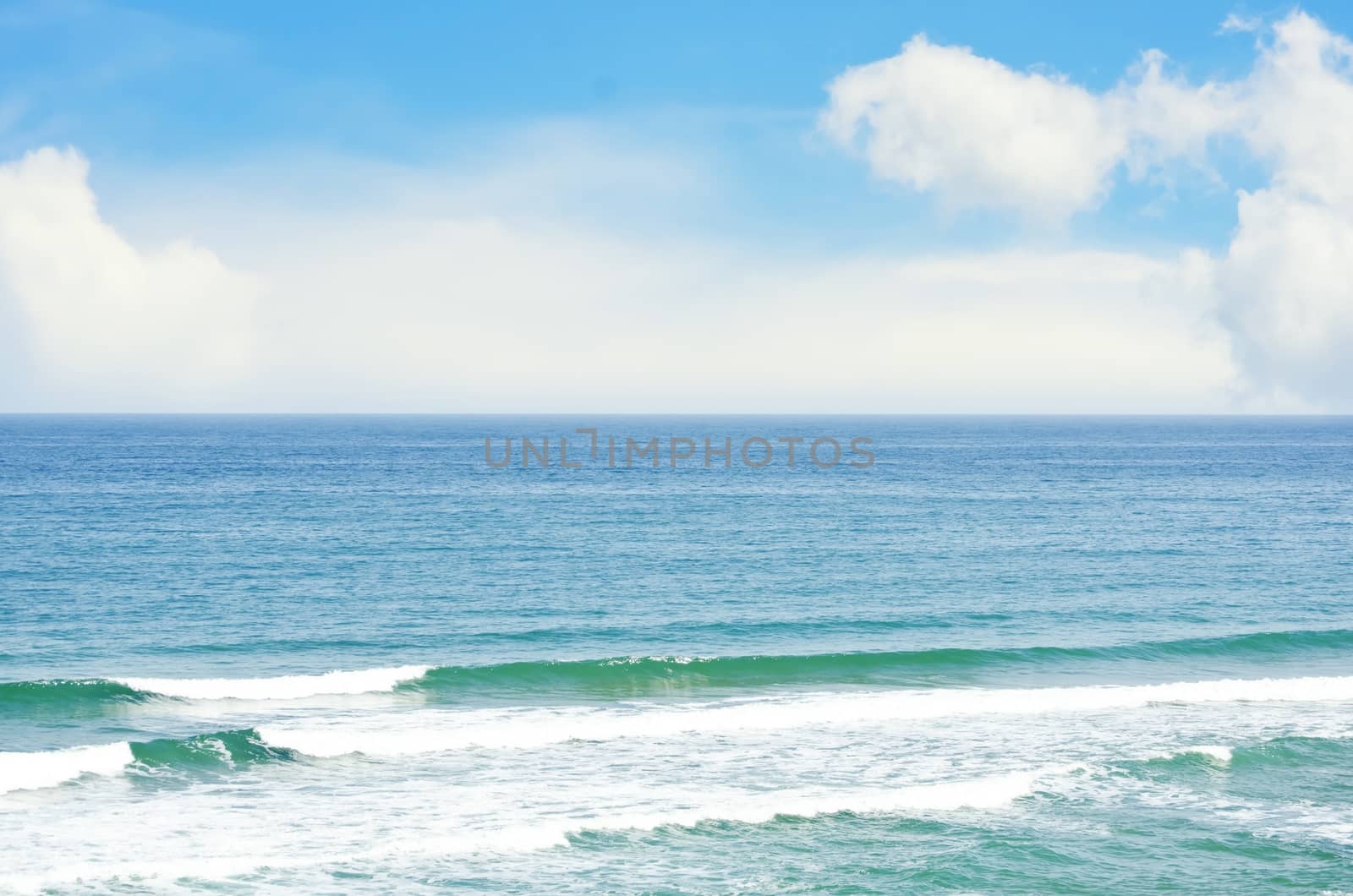 Photo of the Wavy Sea Blue Background 