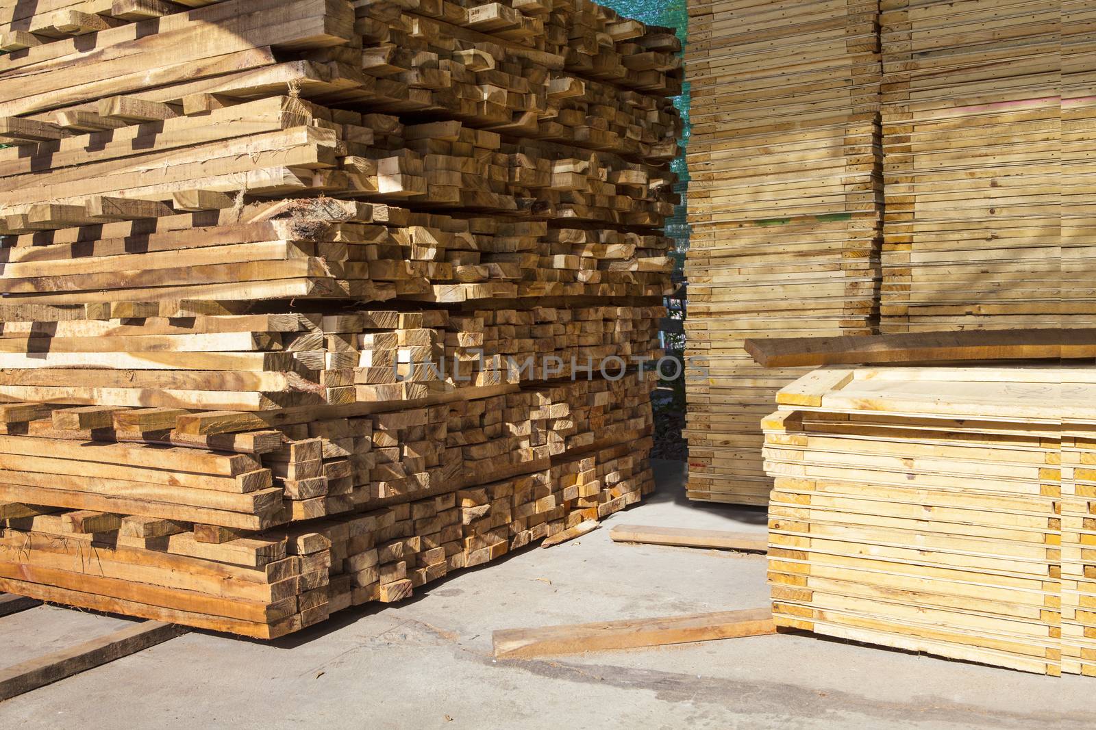 stack of pile wood bar in lumber yard factory use for construction wood industry