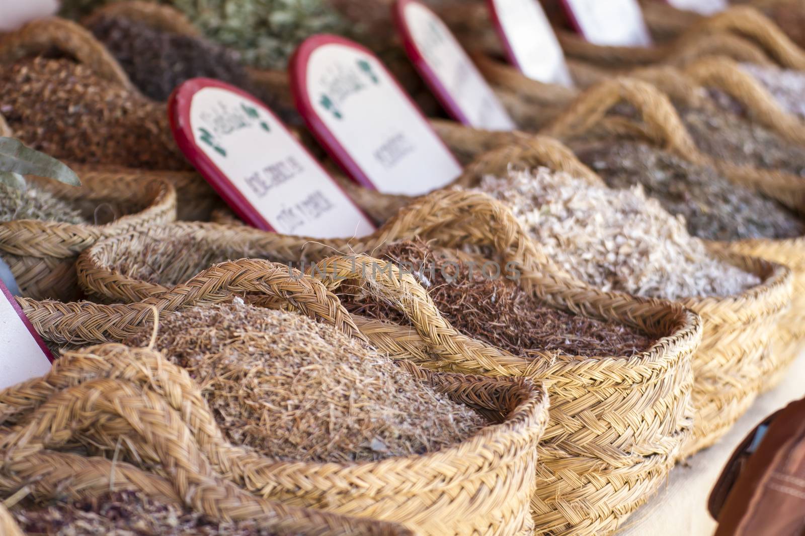 Herbal, wicker baskets stuffed medicinal healing herbs by FernandoCortes