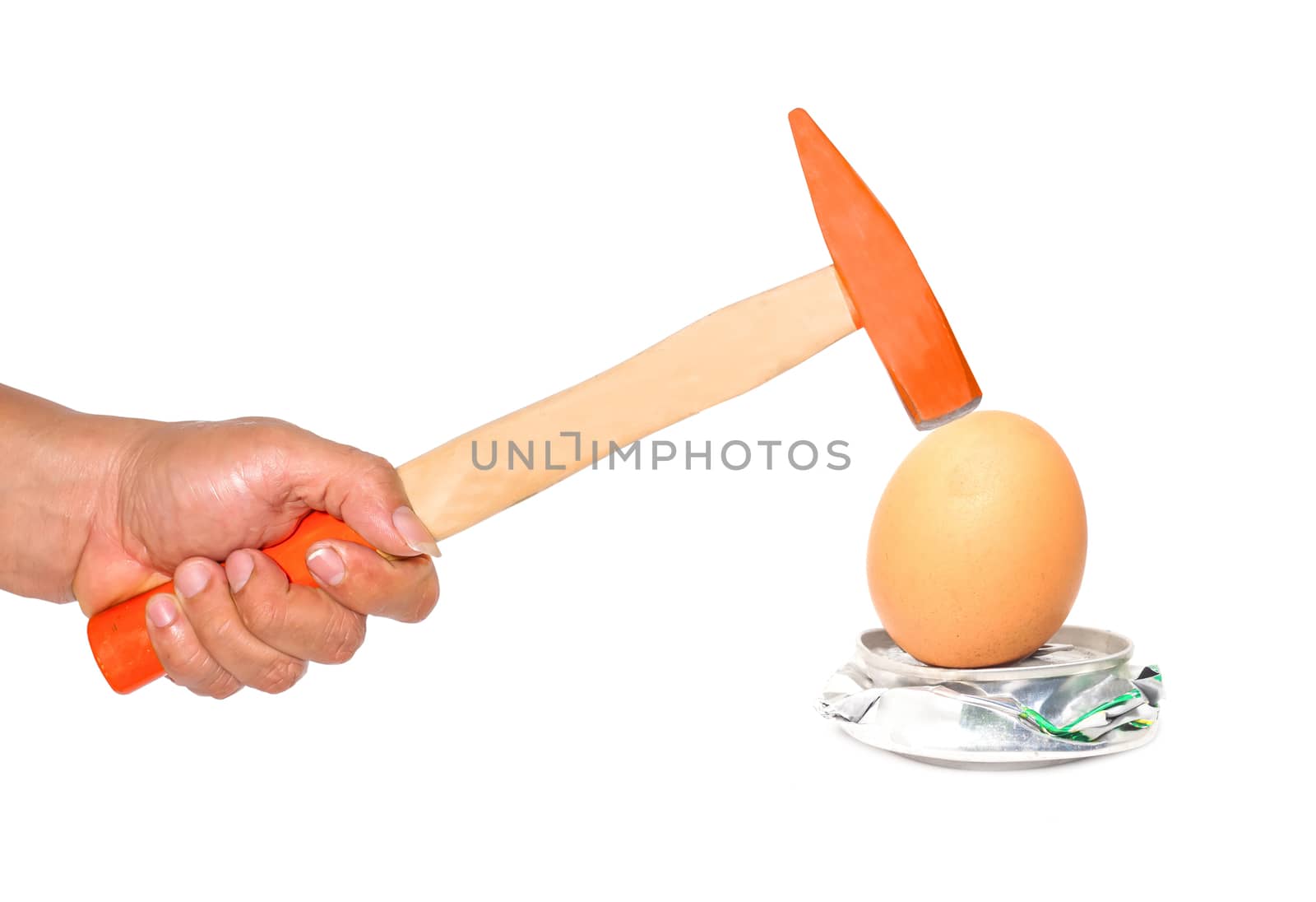 Hammer hitting an egg