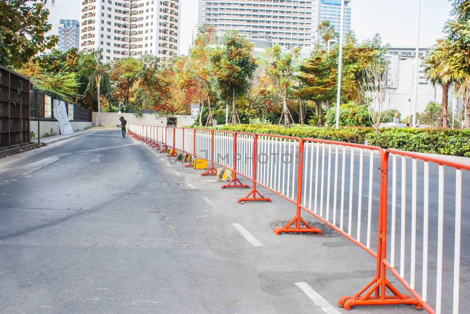 traffic fence on a parking lot in the park.