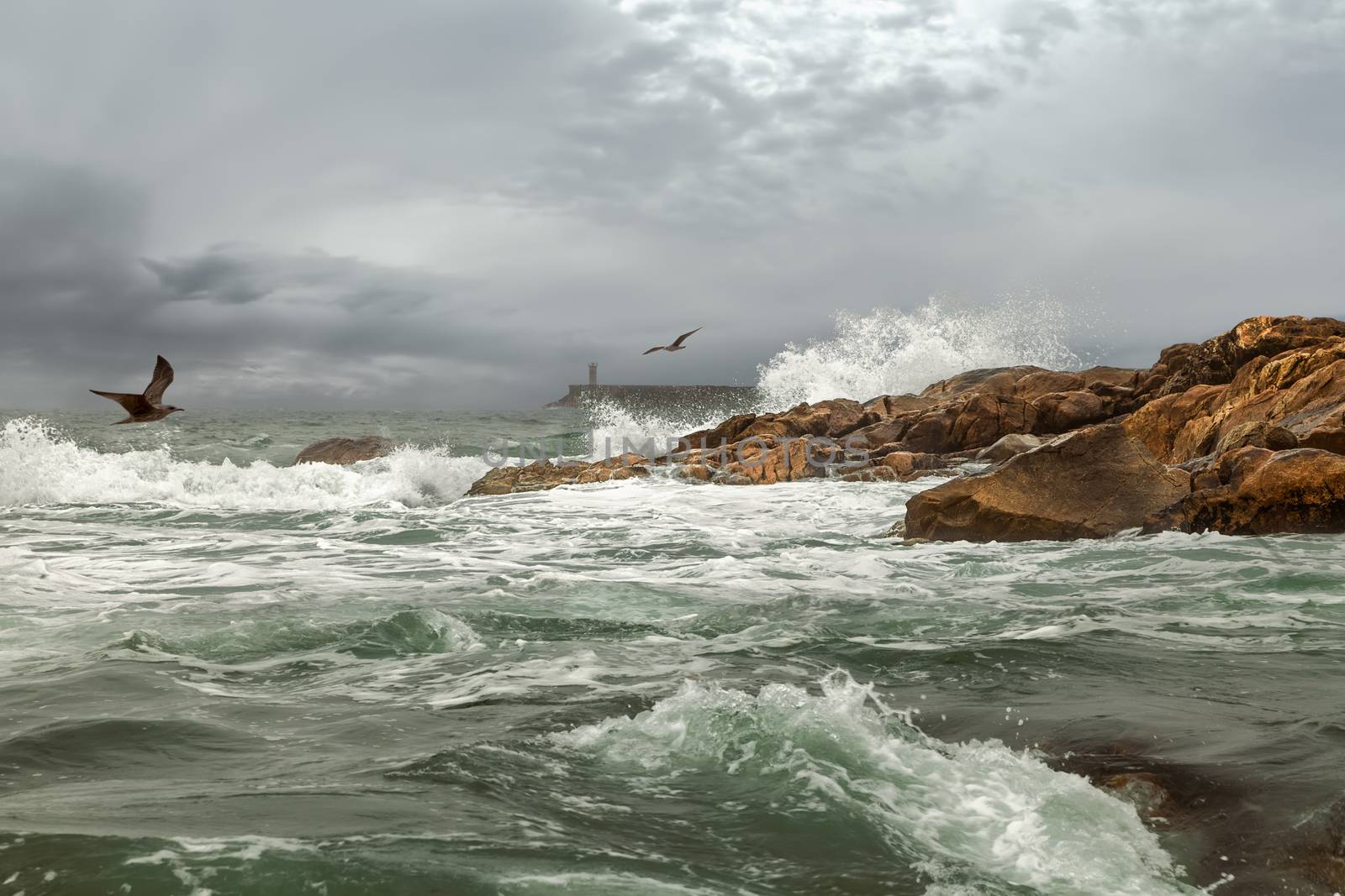 The ocean westbound of Portugal at the water mouth of the River Douro in Porto in autumn