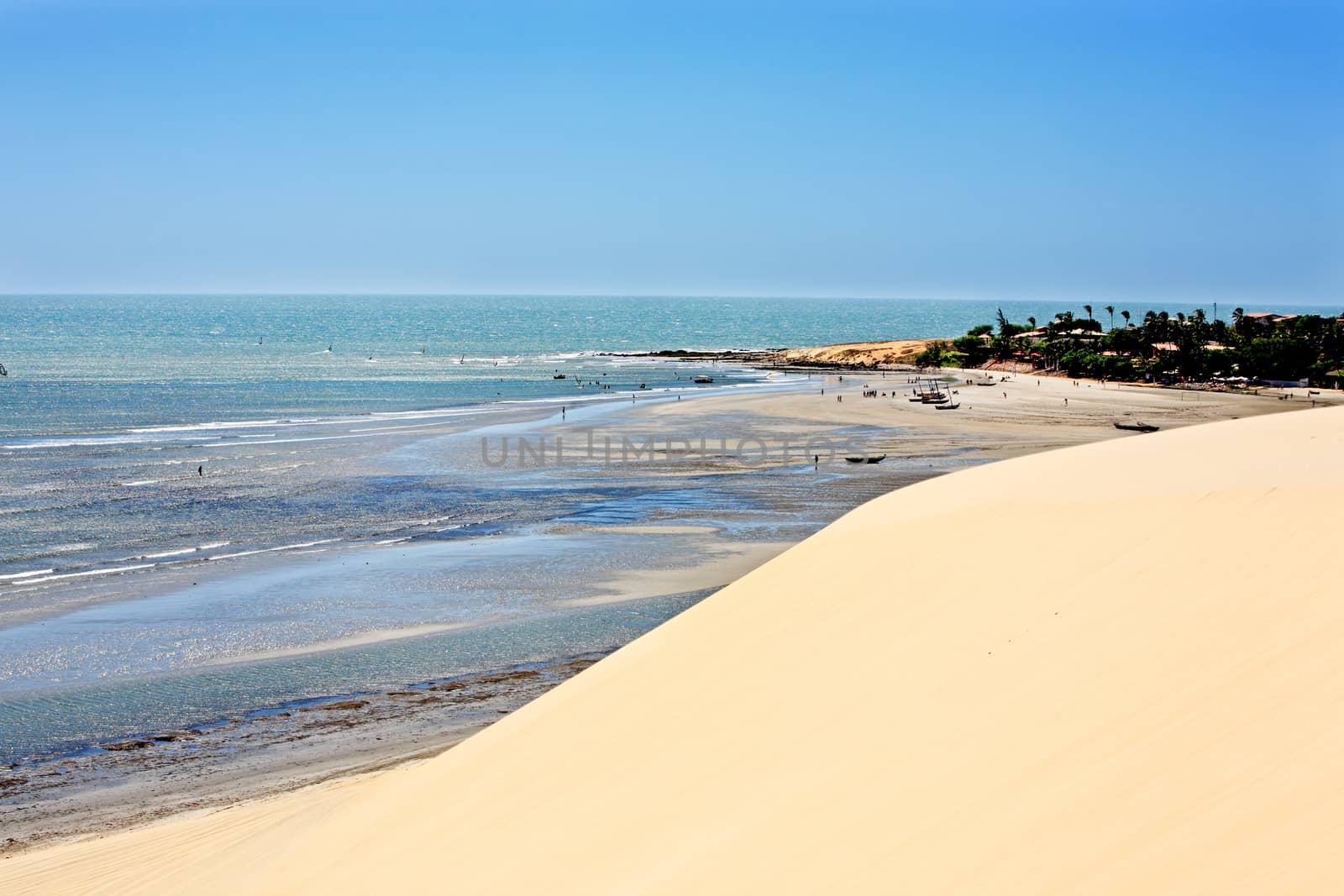 view of the big sand dune of the beautiful fisherman village of Jericoacoara in ceara state brazil