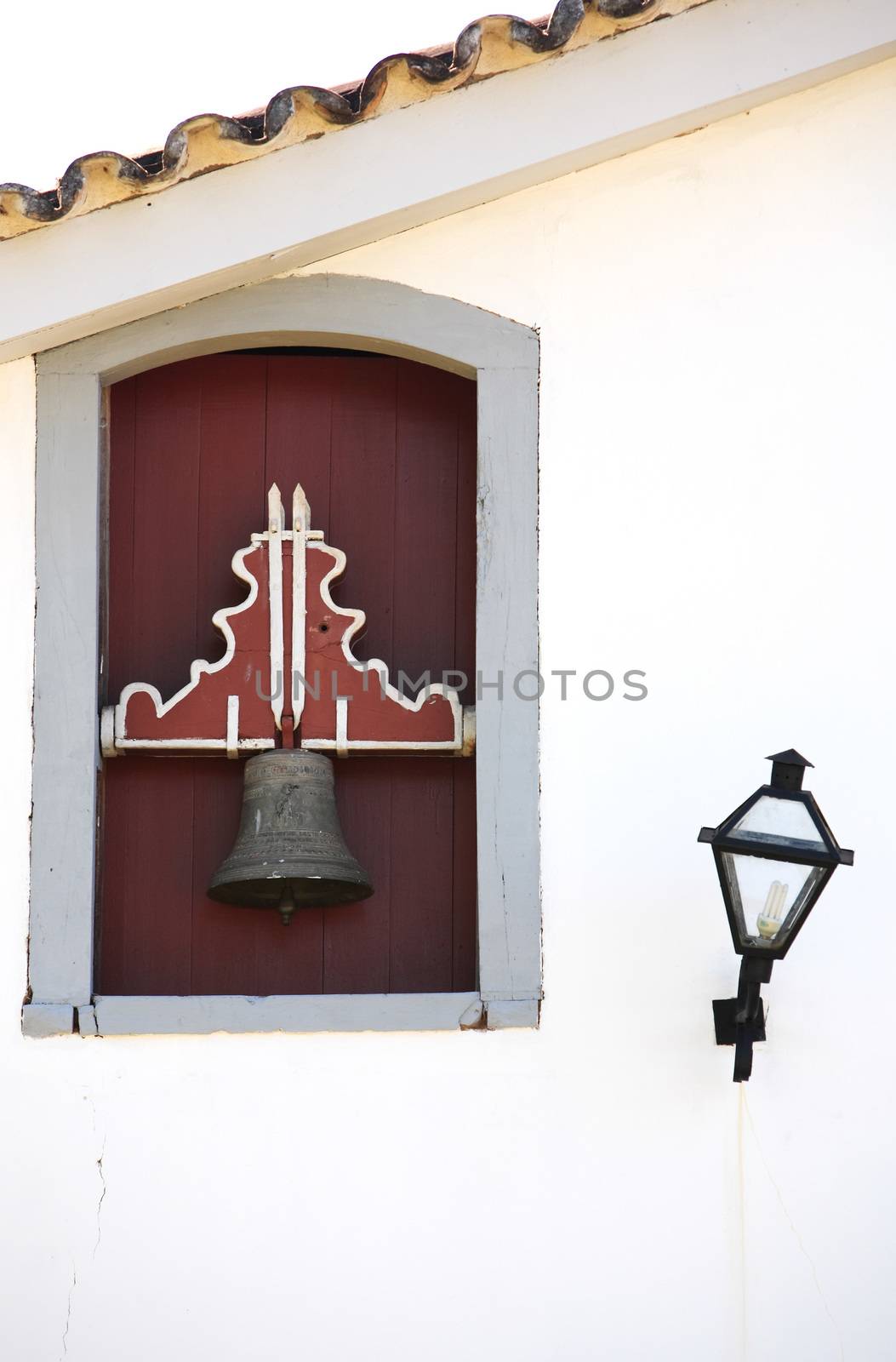 bell in a facade at Tiradente in Minas Gerais state in Brazil