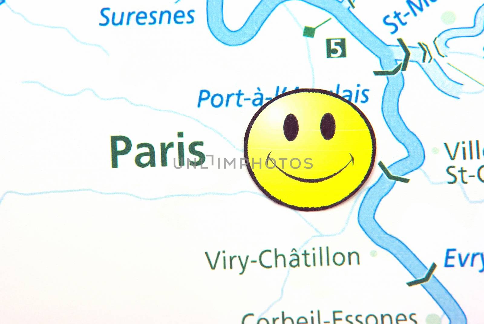 Paris travel concept: happy face on France map.