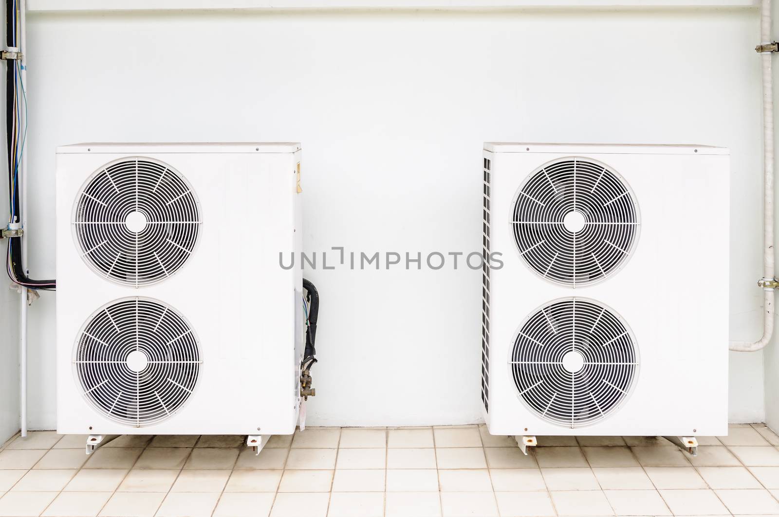 Compressor of air condition by NuwatPhoto