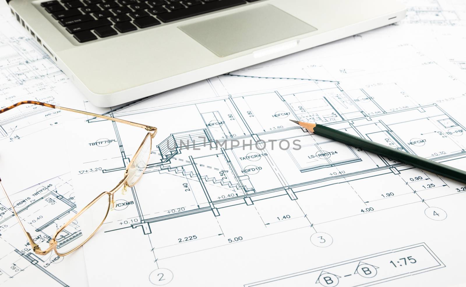 house blueprints and floor plan with keyboard by vinnstock