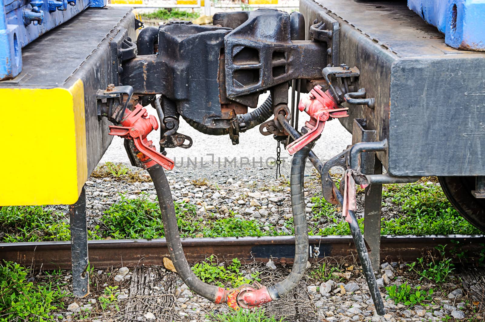 Coupling between two train cars  by NuwatPhoto