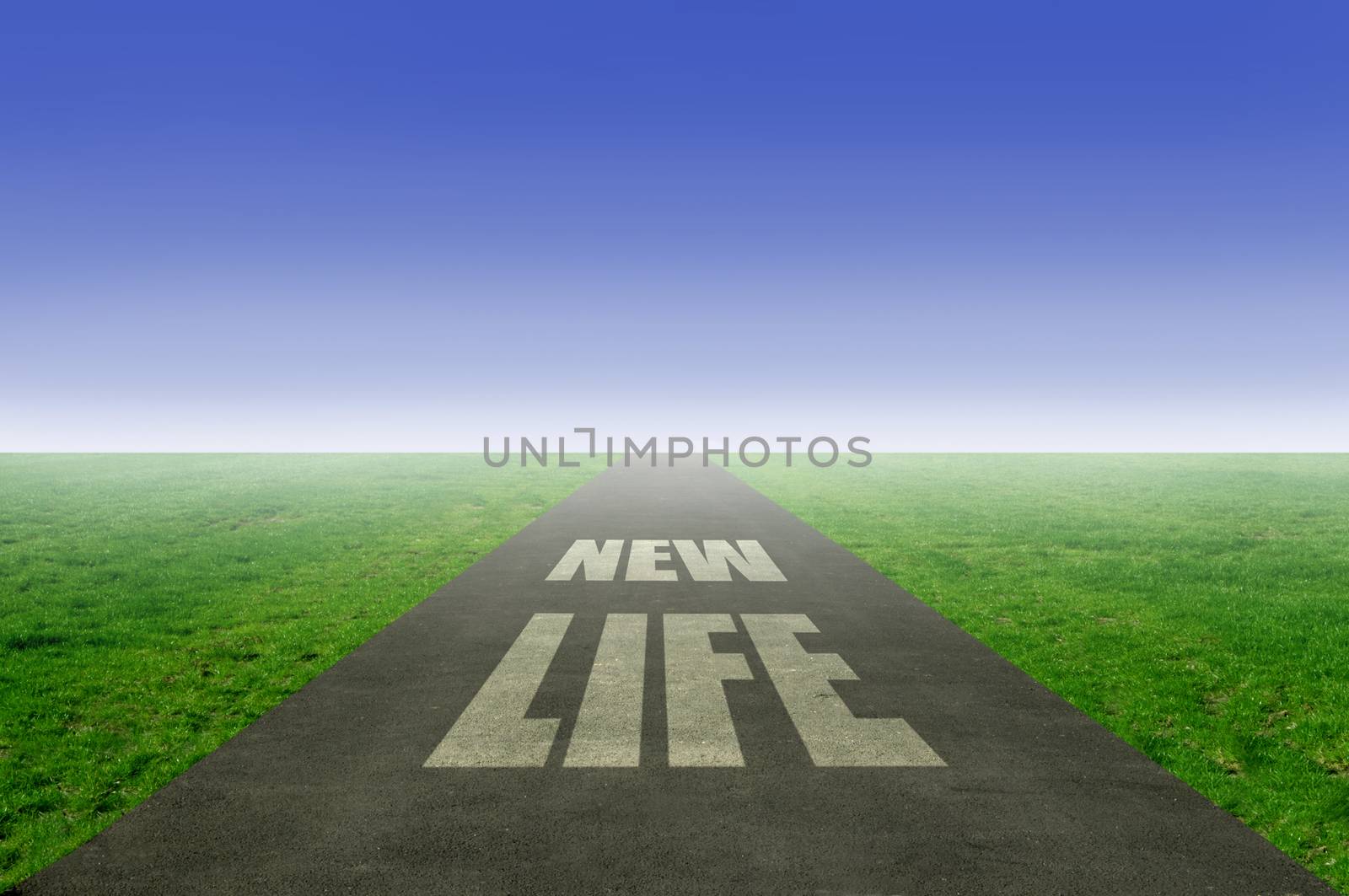 New life, fresh start concept with open road leading towards the horizon