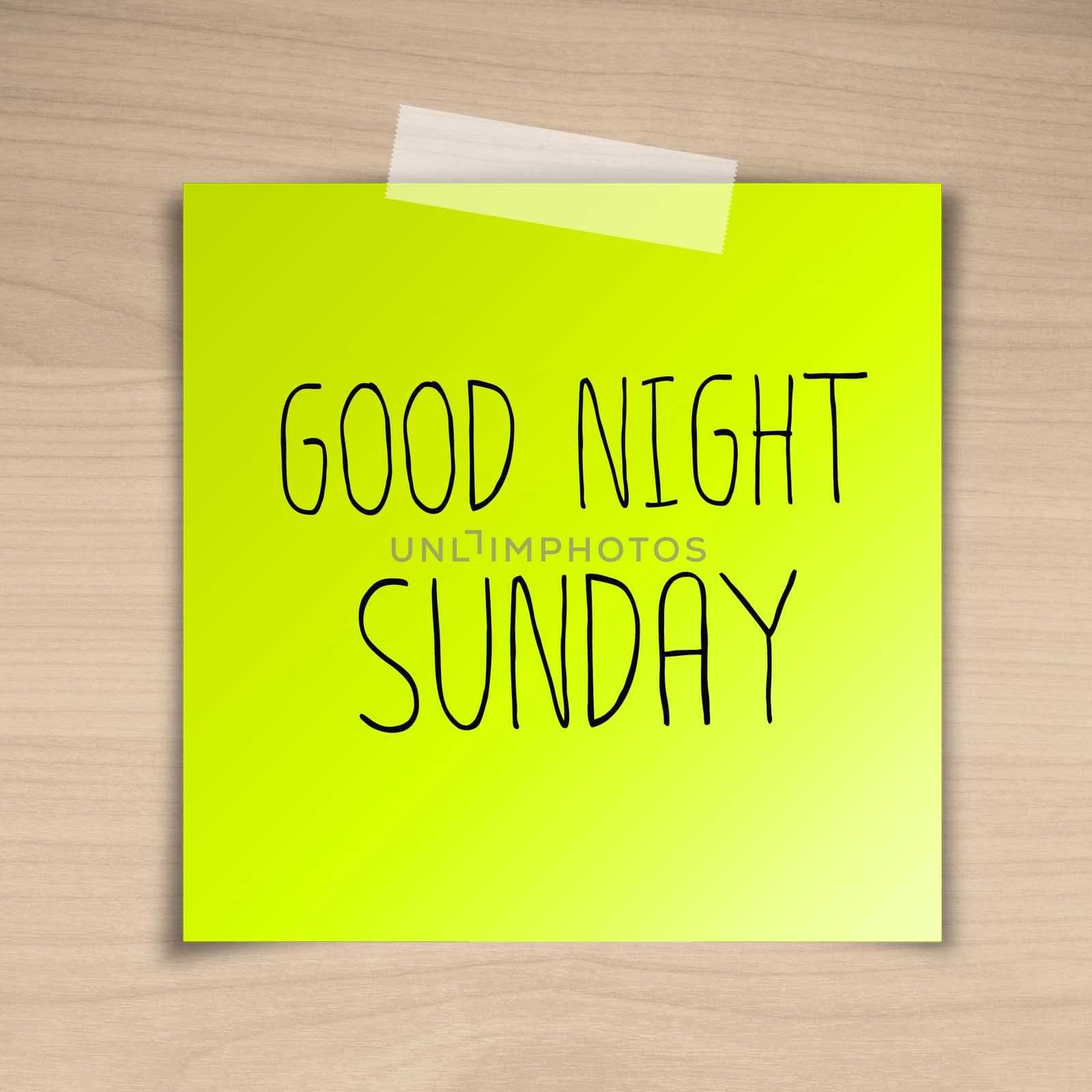 Good night sunday sticky paper on brown wood background texture