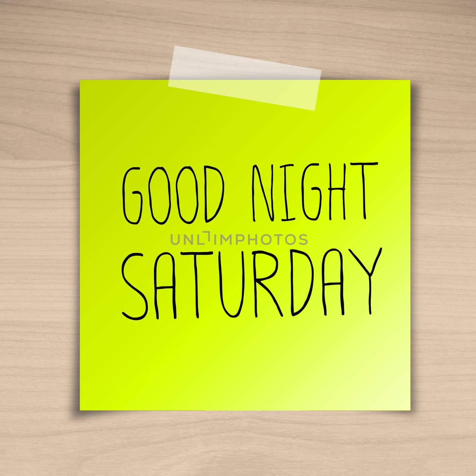 Good night saturday sticky paper on brown wood background texture