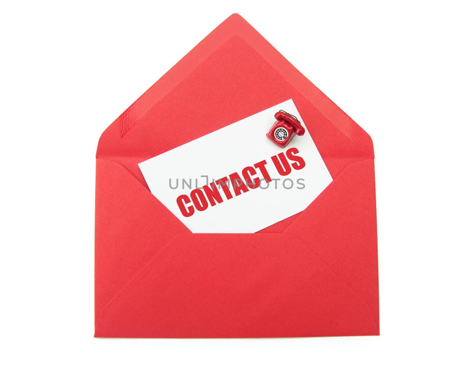 Contact us business card inside an open envelope with a small phone on one side 