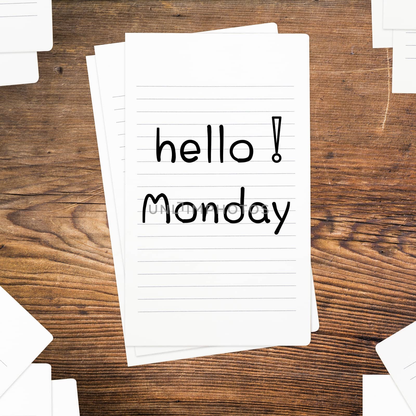 Hello Monday on paper and wood table desk